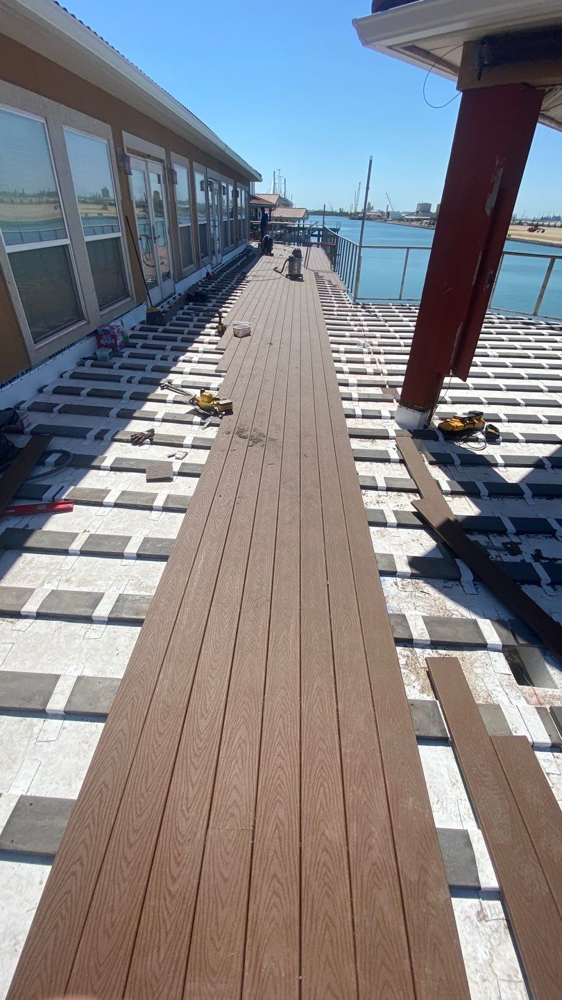Walk Out Patio Cover by Bayfront Roofing and Construction