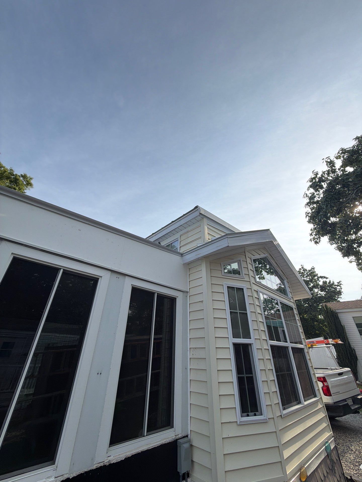 White Standing Seam Metal Roof Installation in Wake, VA by Cade Construction