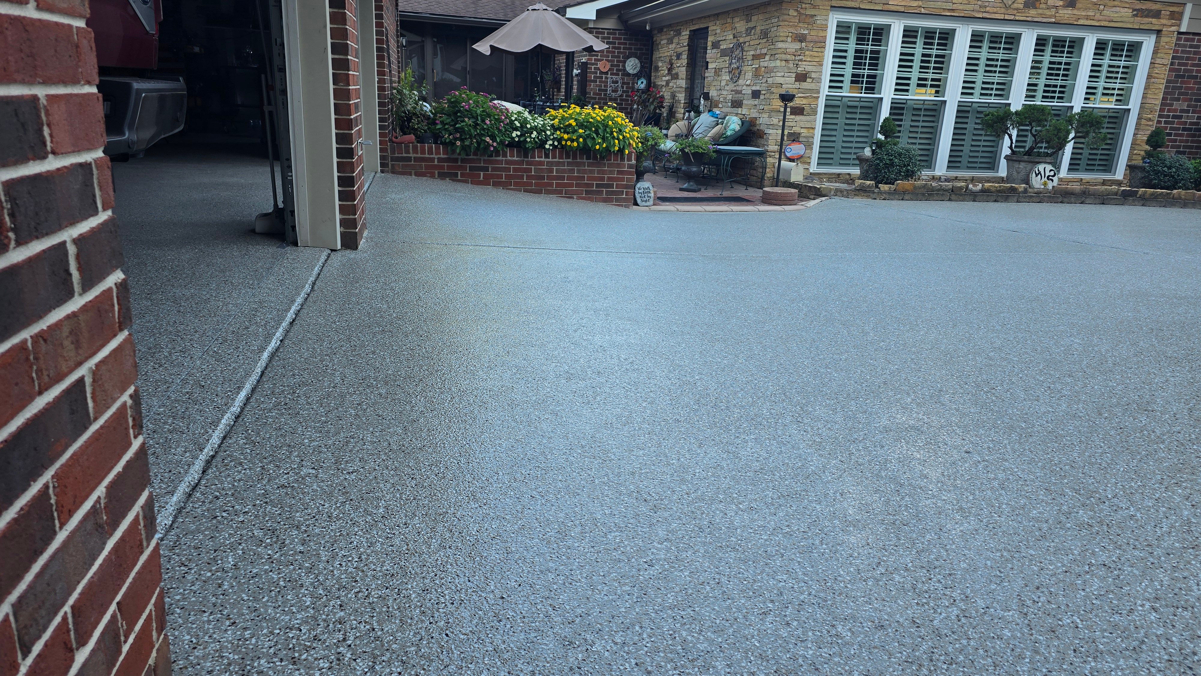 Driveway, Garage, Porch, and Sidewalk using Creekbed by Elite Floor Solutions