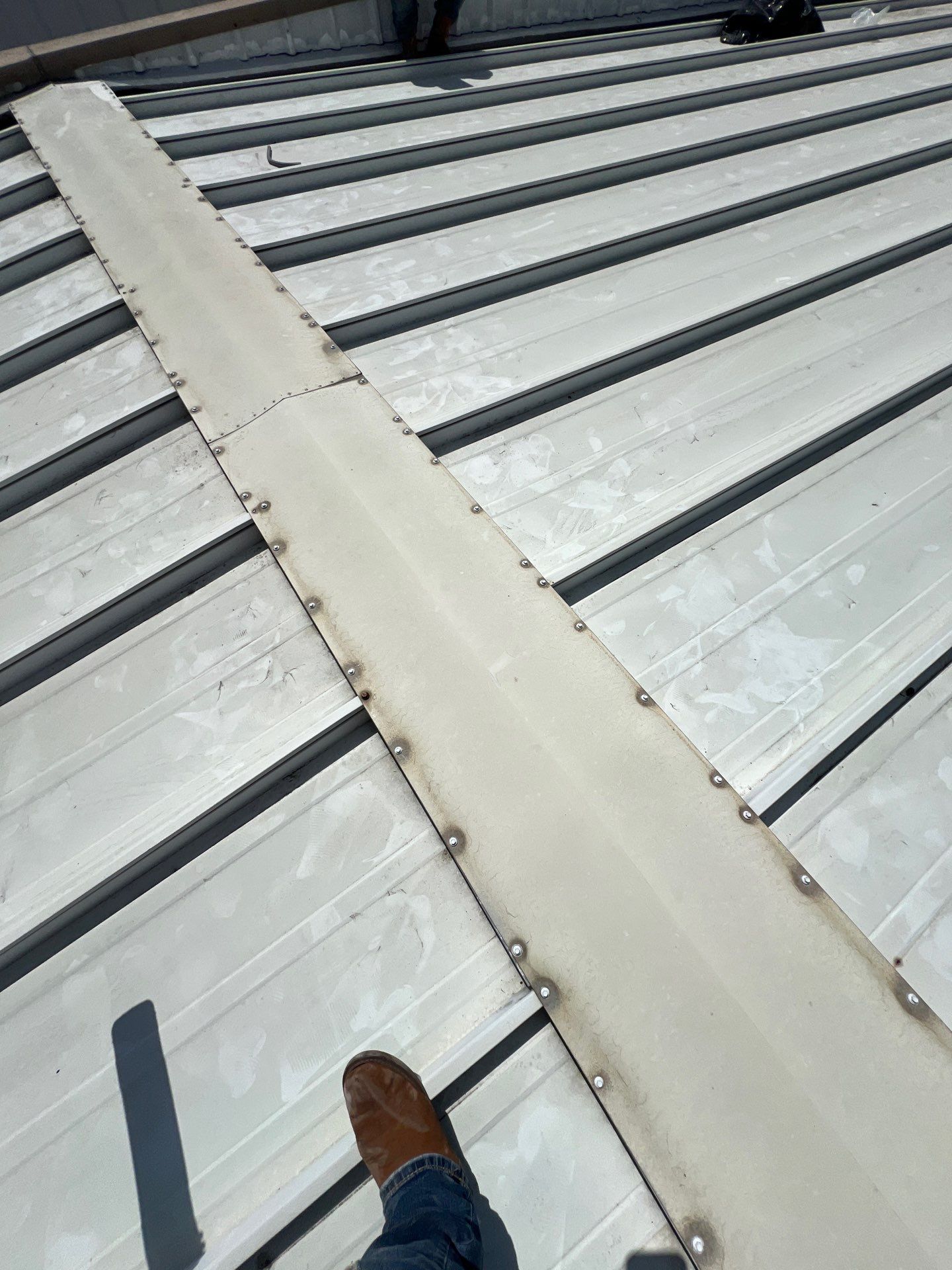 Commercial Roofing Repair using Metal by Roof Repair Company