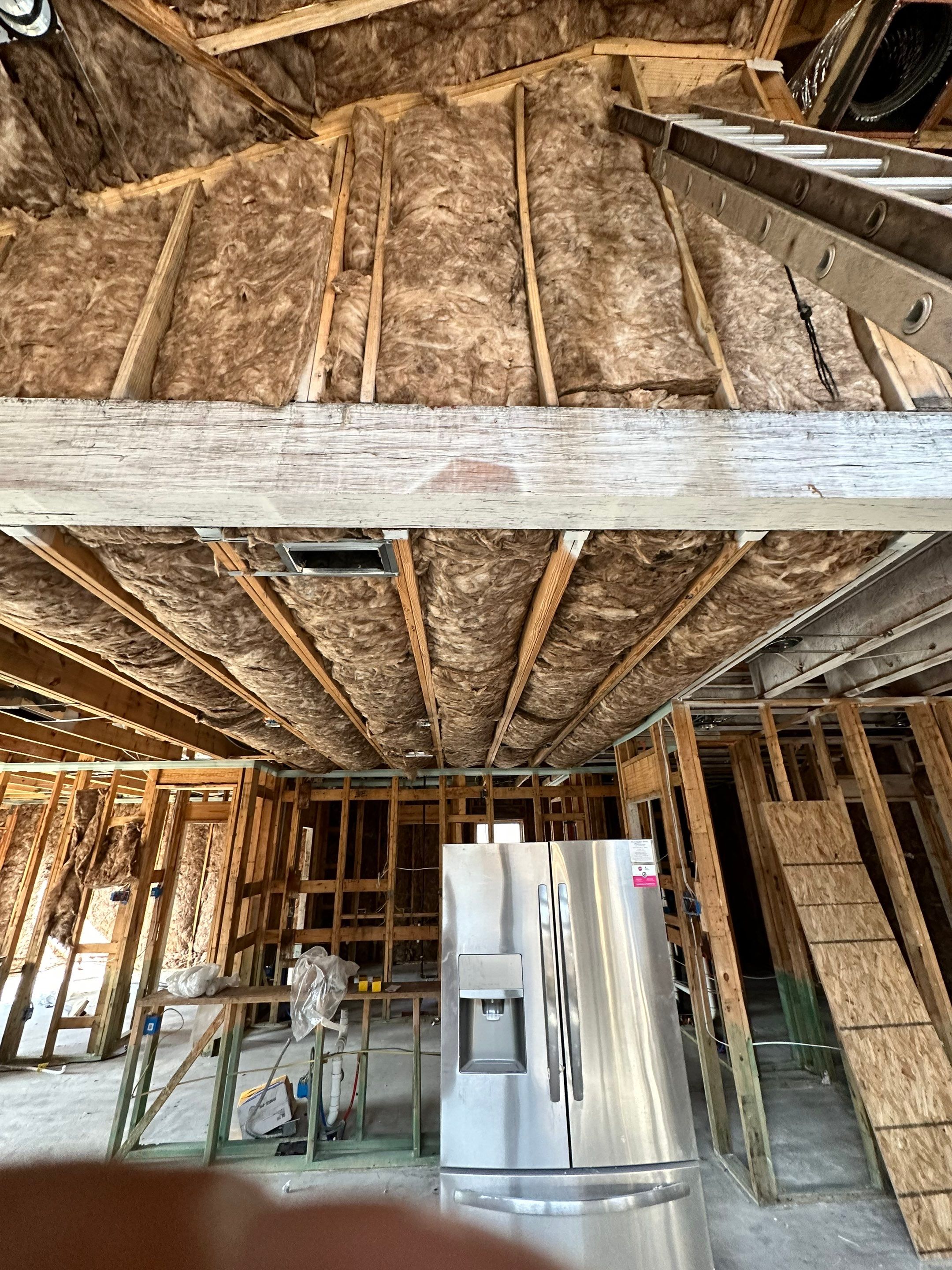 Fiberglass batt install on new construction home in Ft Worth by Apex Insulation Solutions