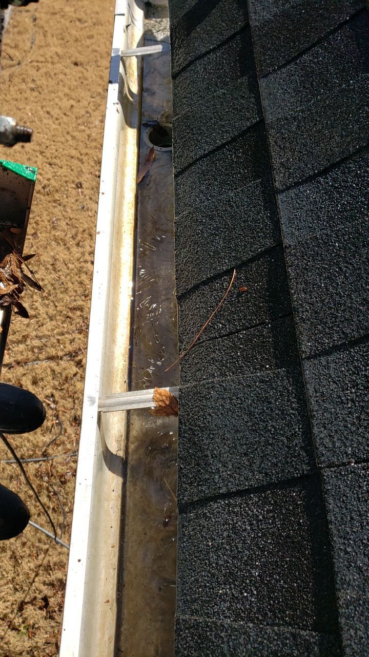 Gutter Cleaning using water by Power Wash Masters LLC