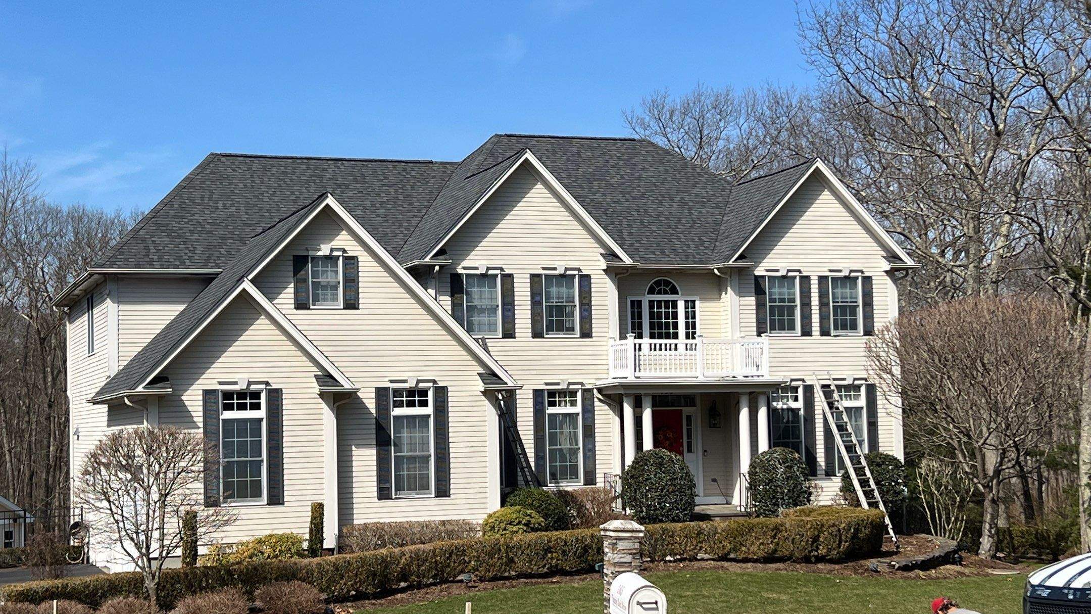 Pewterwood Roofs by Pinnacle Roofing & Skylights