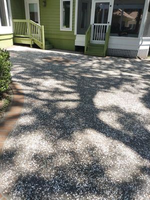 Exposed Aggregate Patio with Brick Inlays and Retaining Wall in Okatie