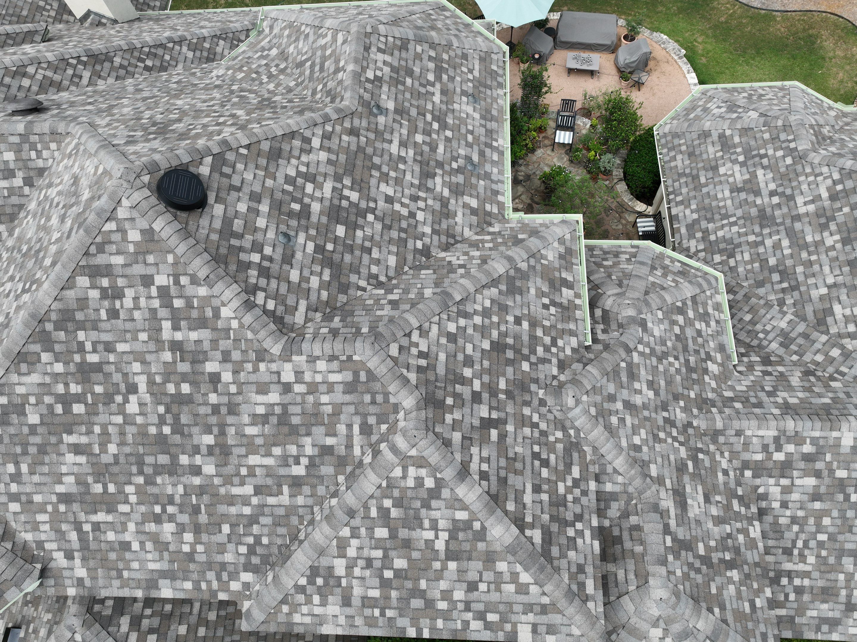Residential Roof Replacement using 30 Year Laminate Shingles with High Profile Ridge by Premier Roofing and Contracting