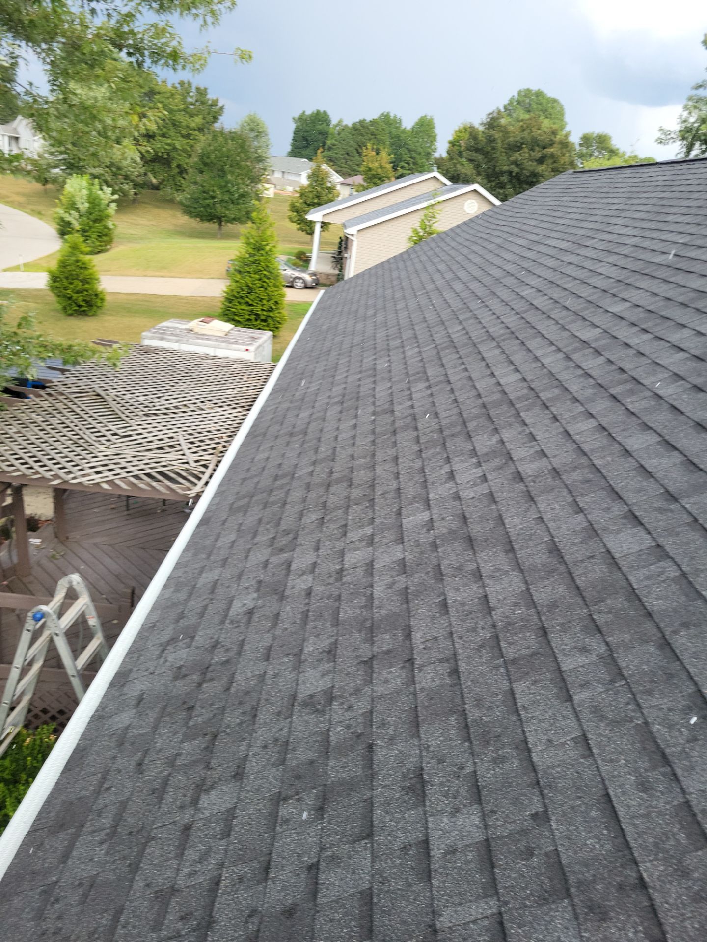 Residential Roof + Gutter & Downspouts & Gutter Guards Install  by Titan Commercial & Residential Roofing 