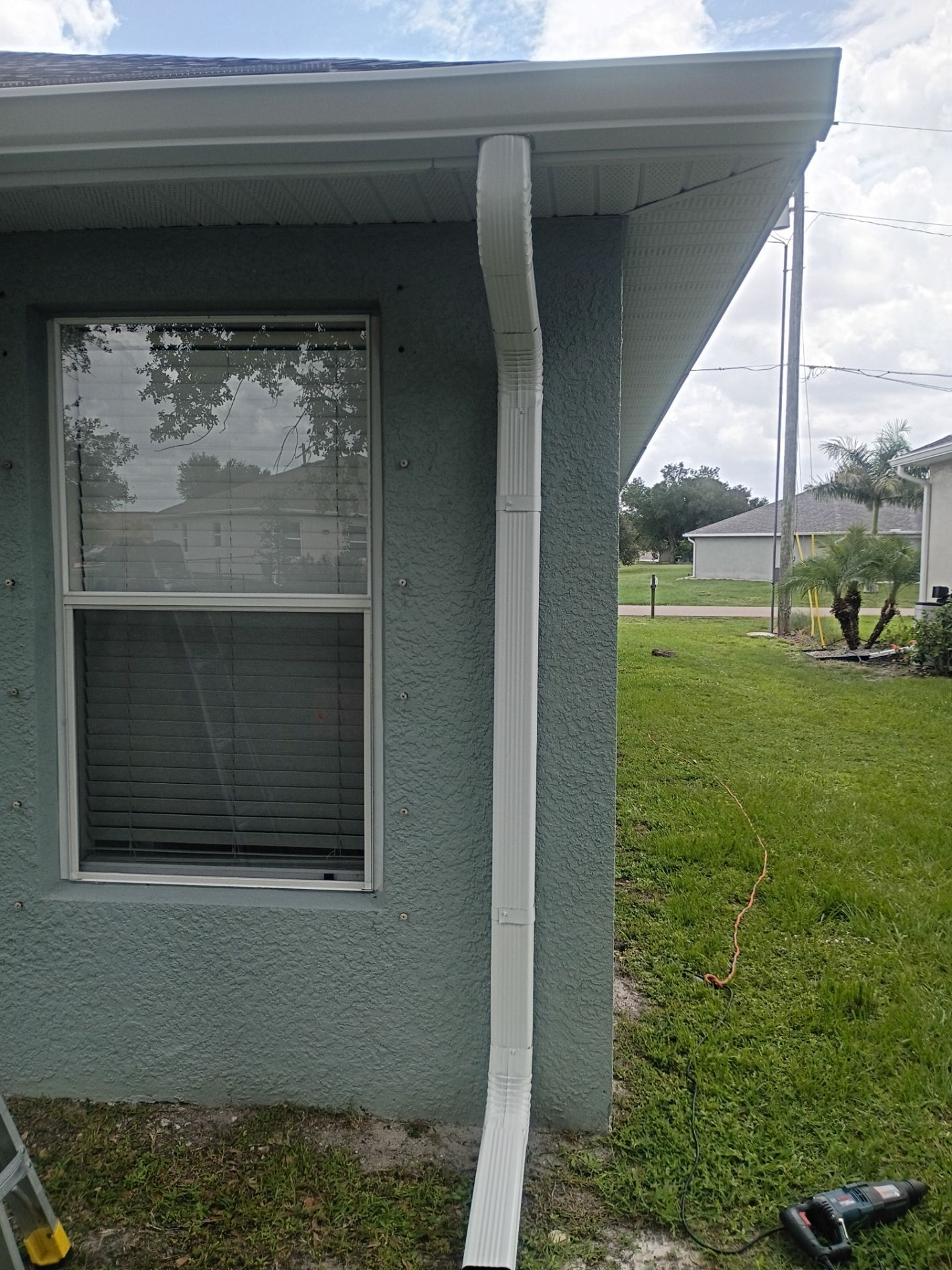 Gutter Guard and New Downspouts Installation in Punta Gorda FL by Gutter Professors
