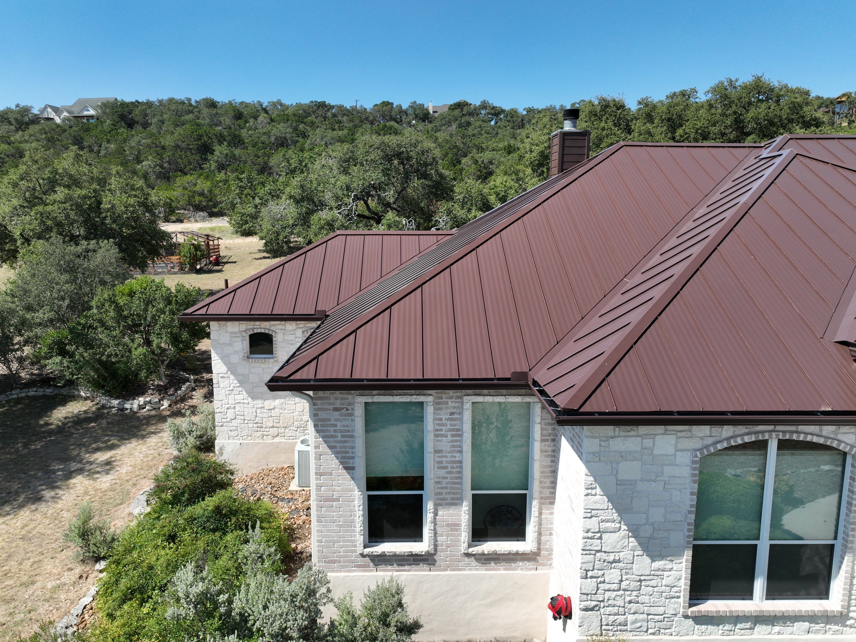 Residential Metal Roof Installation using McElroy Metal by Premier Roofing and Contracting