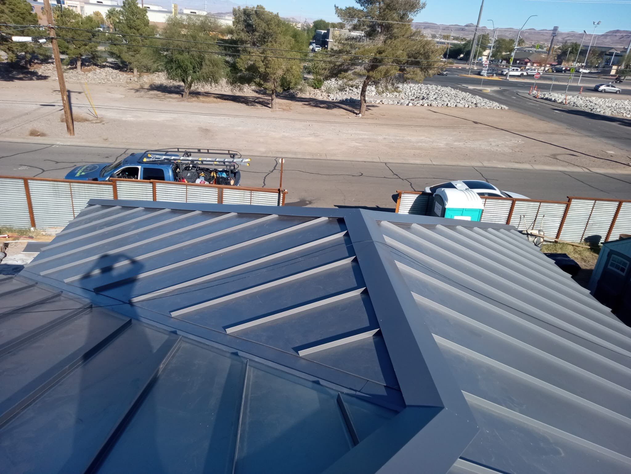 Charcoal Gray Standing Seam by Reimagine Roofing