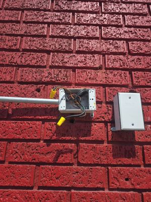 Exterior Receptacle Rough-In / Wiring — Weatherproof Box on Brick