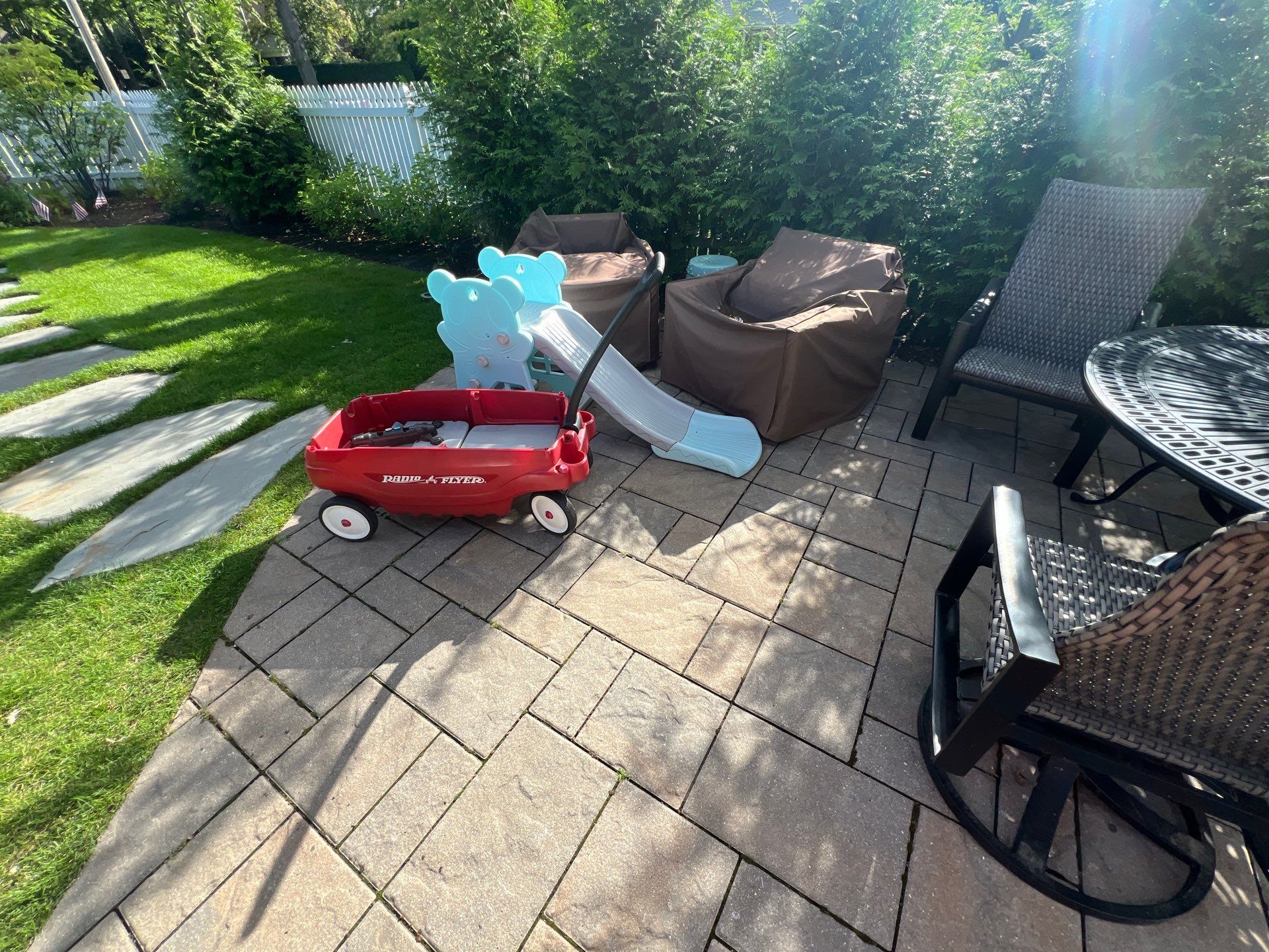 concrete cleaning using Algaecide, soft wash soap by Northern Power Washing LLC.