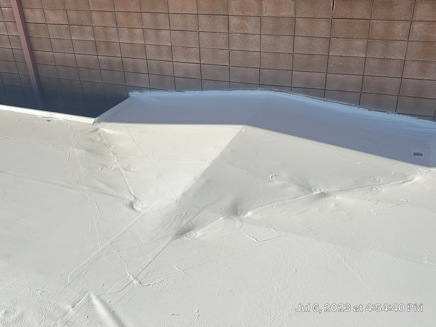 MR Roofing system using Benchmark/PUMA XL coatings over TPO single-ply roofing by Straight Edge Roofing Inc