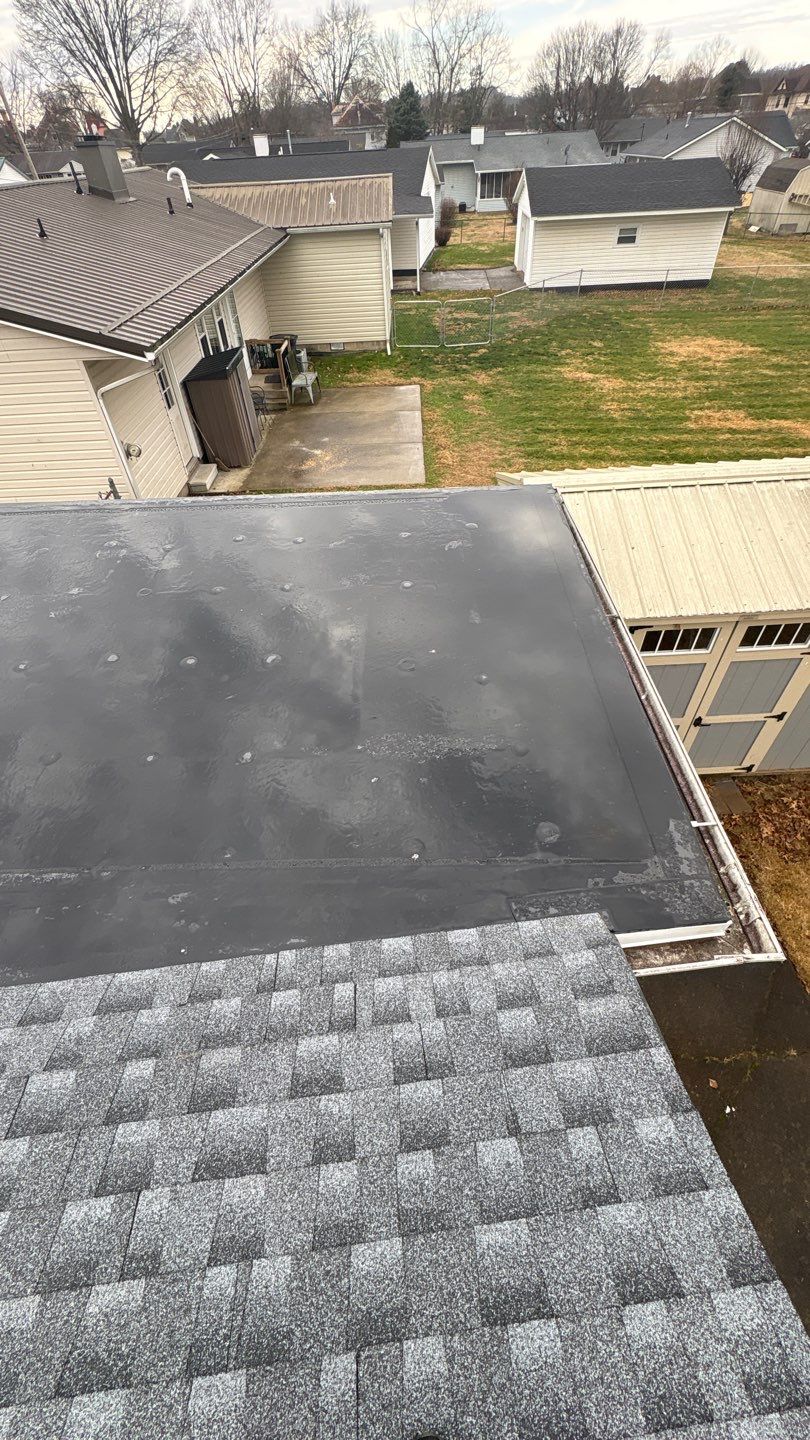 Residential Roofing Installation using EPDM and GAF Timberline HDZ Hickory by Rainstoppers Roofing