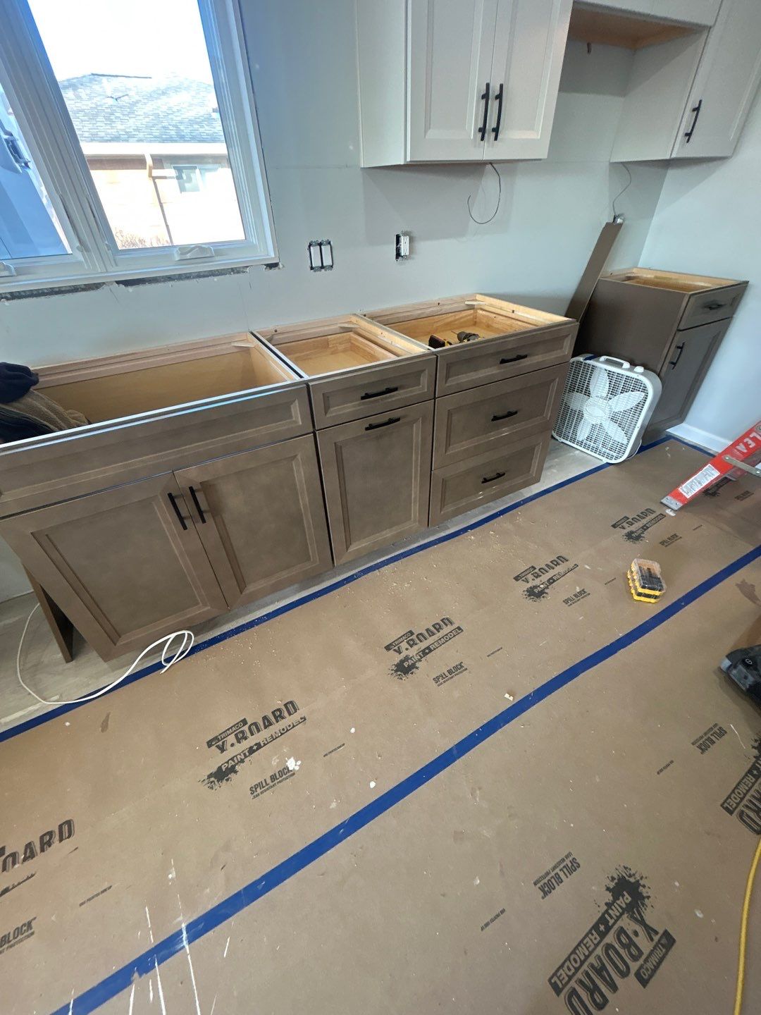 Interior Renovations, Kitchen Remodel, and Window Replacement by Ivy Lea Construction