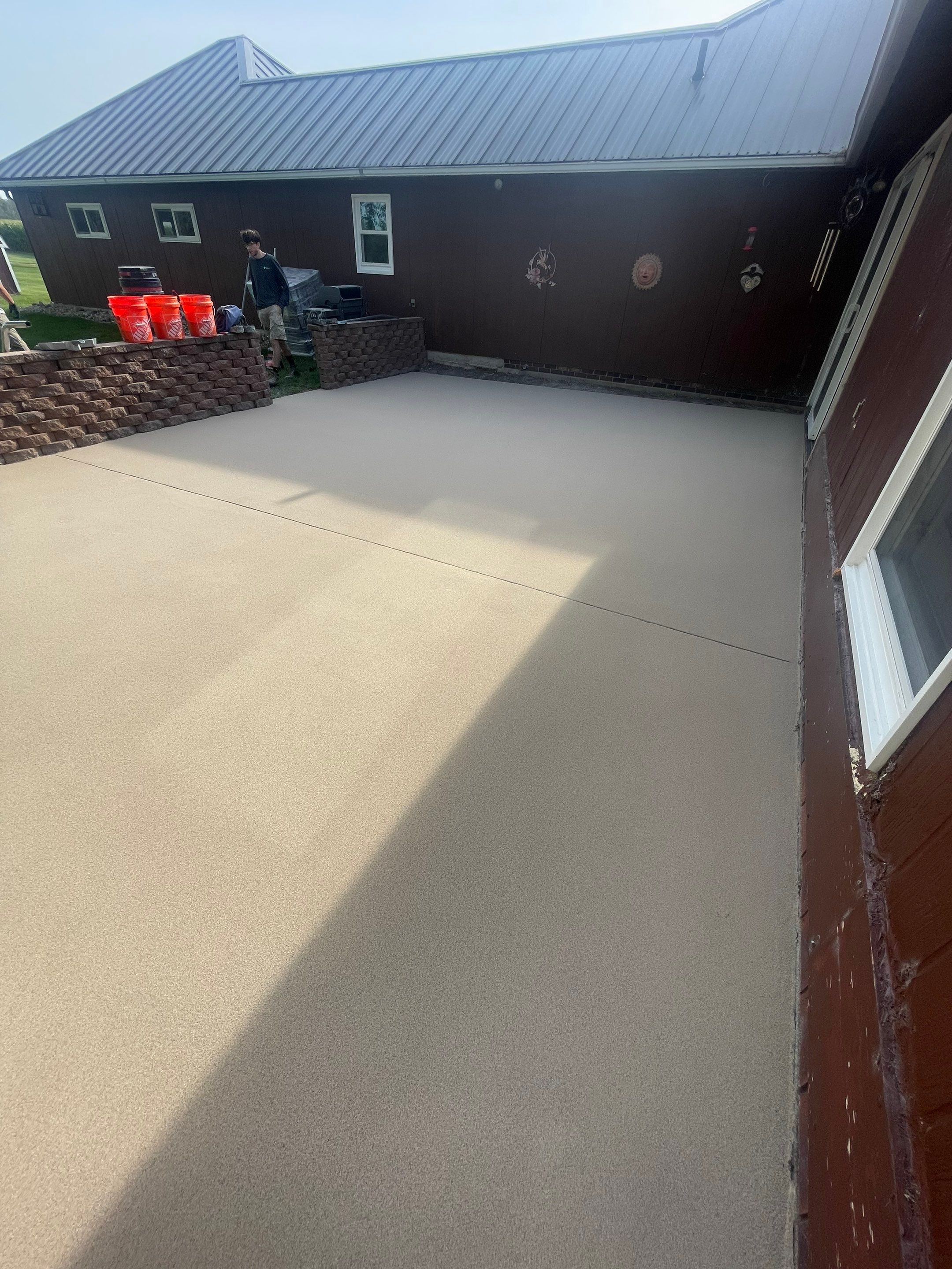 Concrete Patio Resurfacing and Protective Coating in Winfred, South Dakota by Select Painting, Coatings & Garage Cabinets