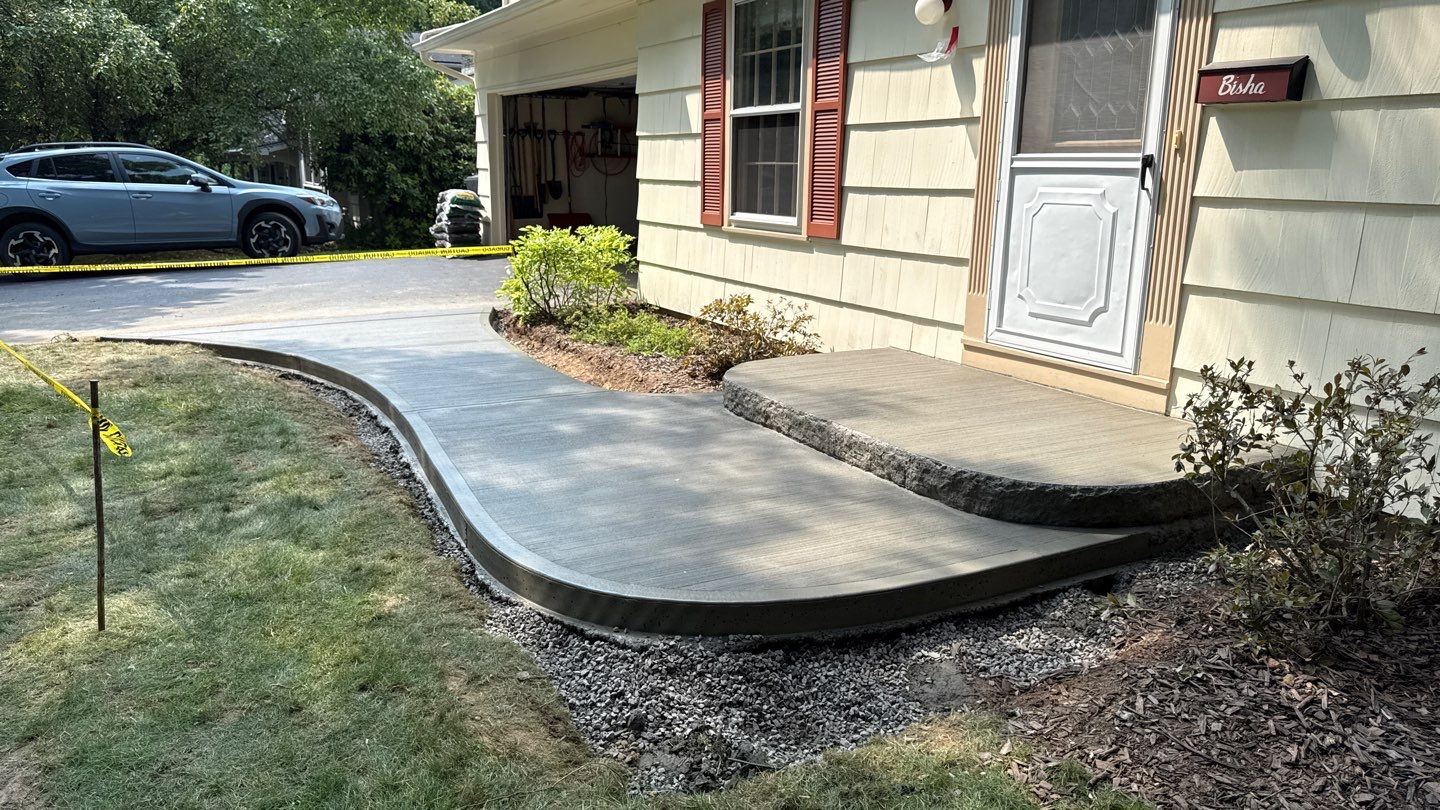 Broom Finish Walkway  by NG Masonry & Construction LLC