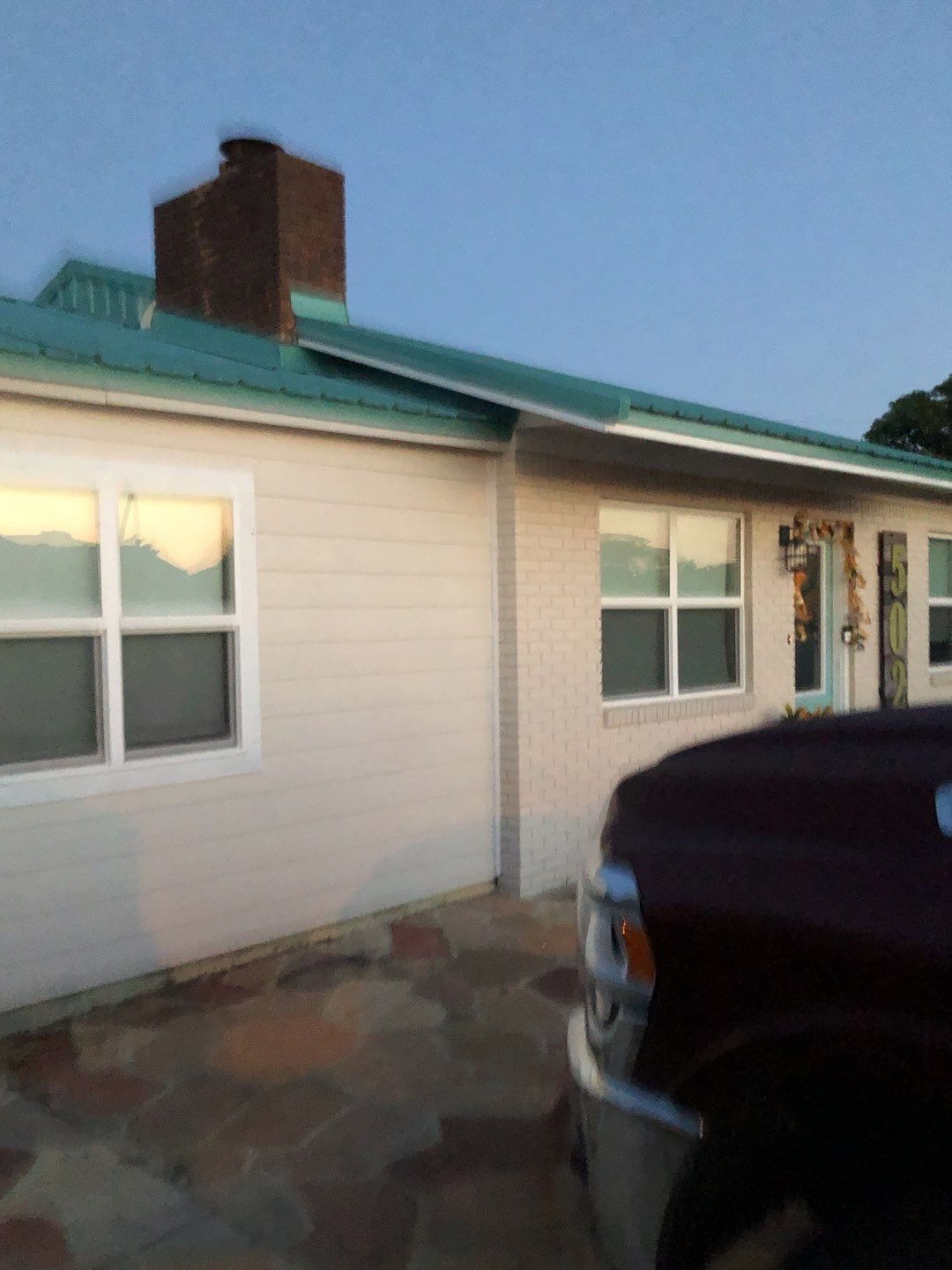 Gutter Installation using K-Style White Seamless Gutters by Gutter Professors