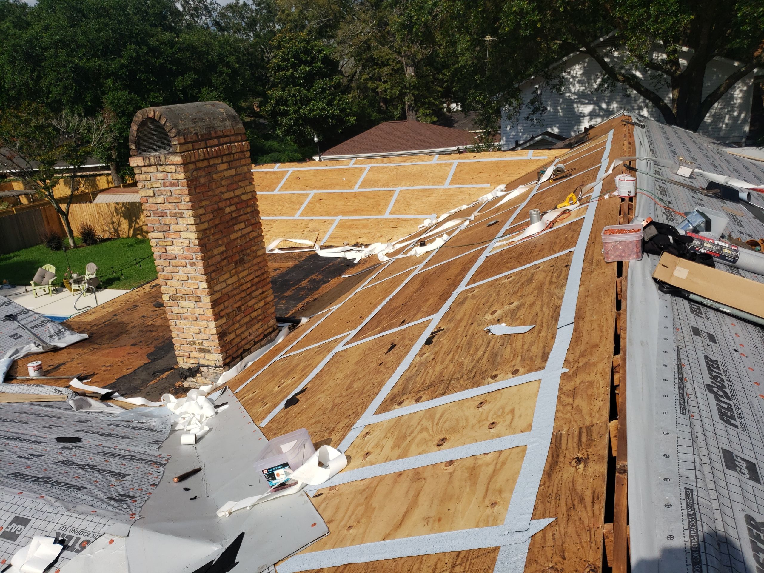 Residential Roofing Installation using Roof Replacement by American Roofing & Construction LLC