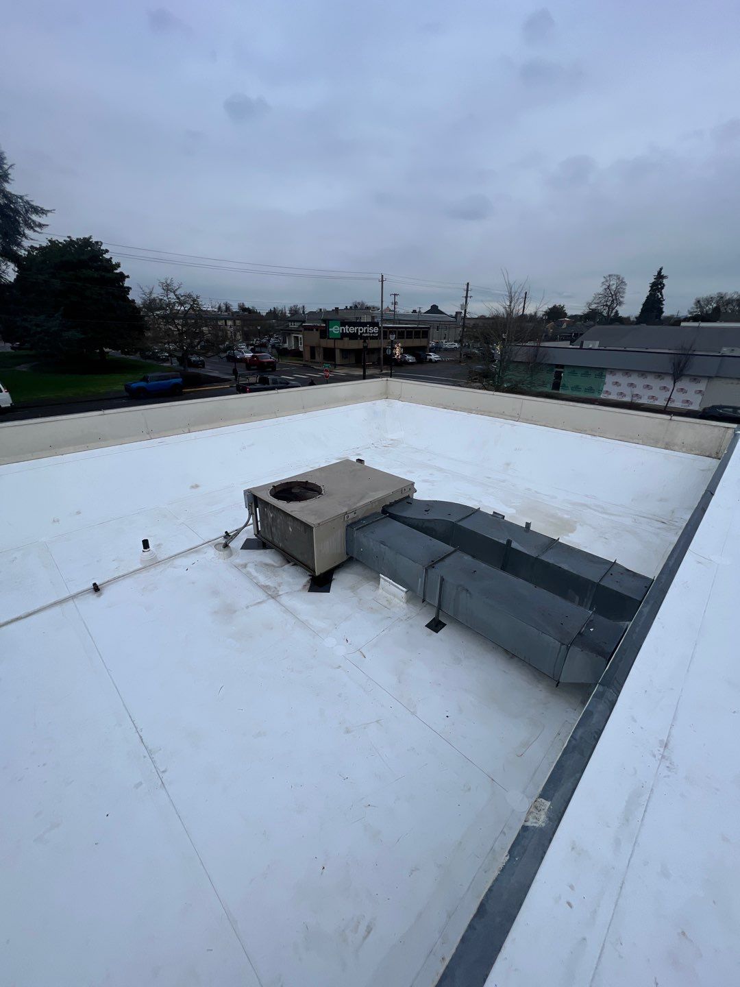 Commercial Flat Roof Installation using GAF 60Mil TPO  by Orezona Building & Roofing Company, Inc.