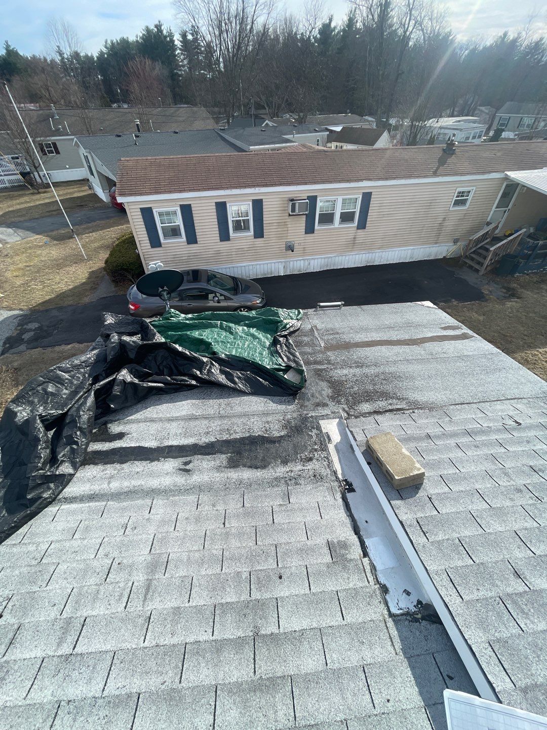Corrugated Metal and Asphalt in Merrimack New Hampshire by Tall pine roofing