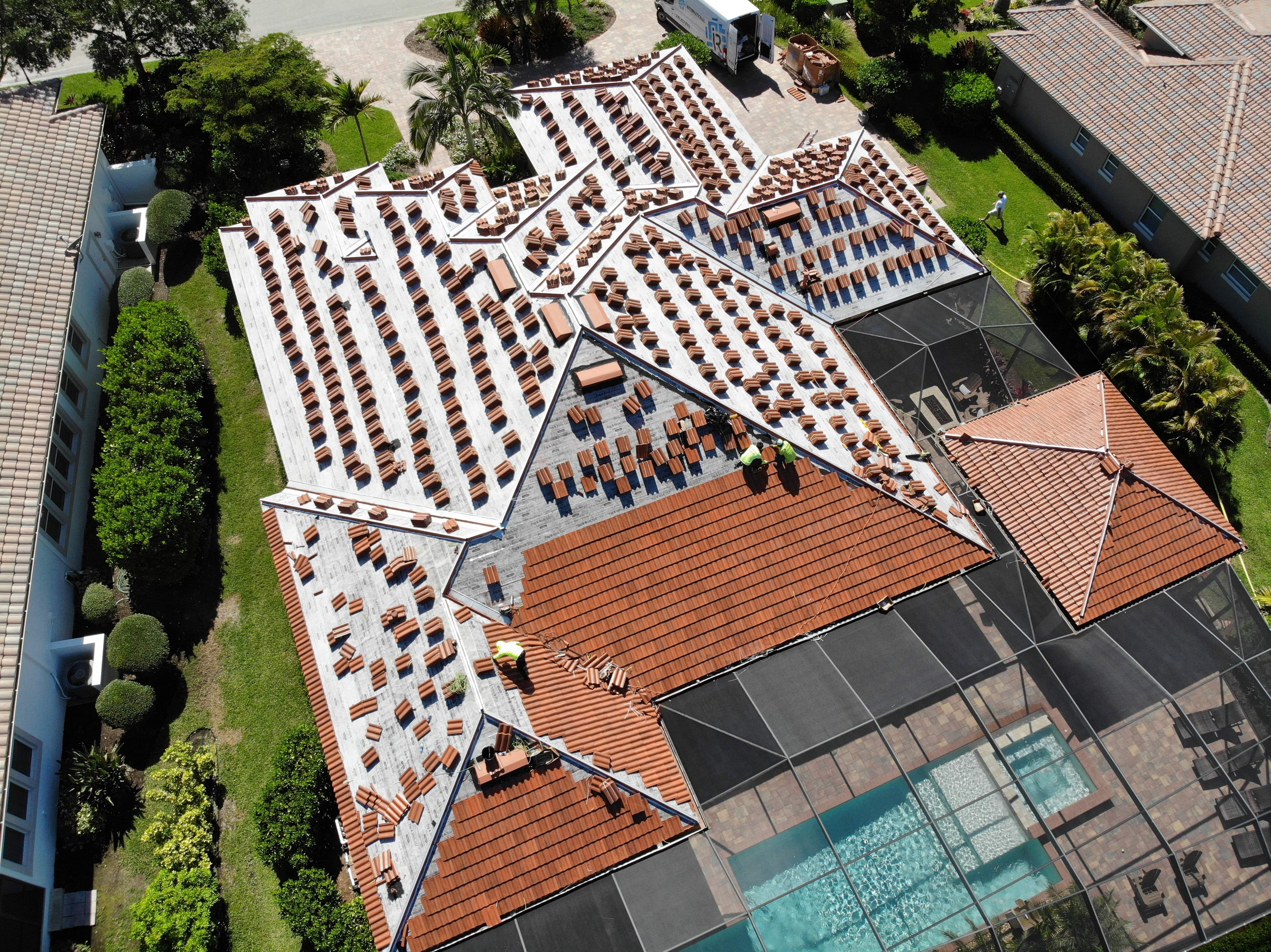 Residential Roofing Installation using Composite Spanish Tile by International Roofing