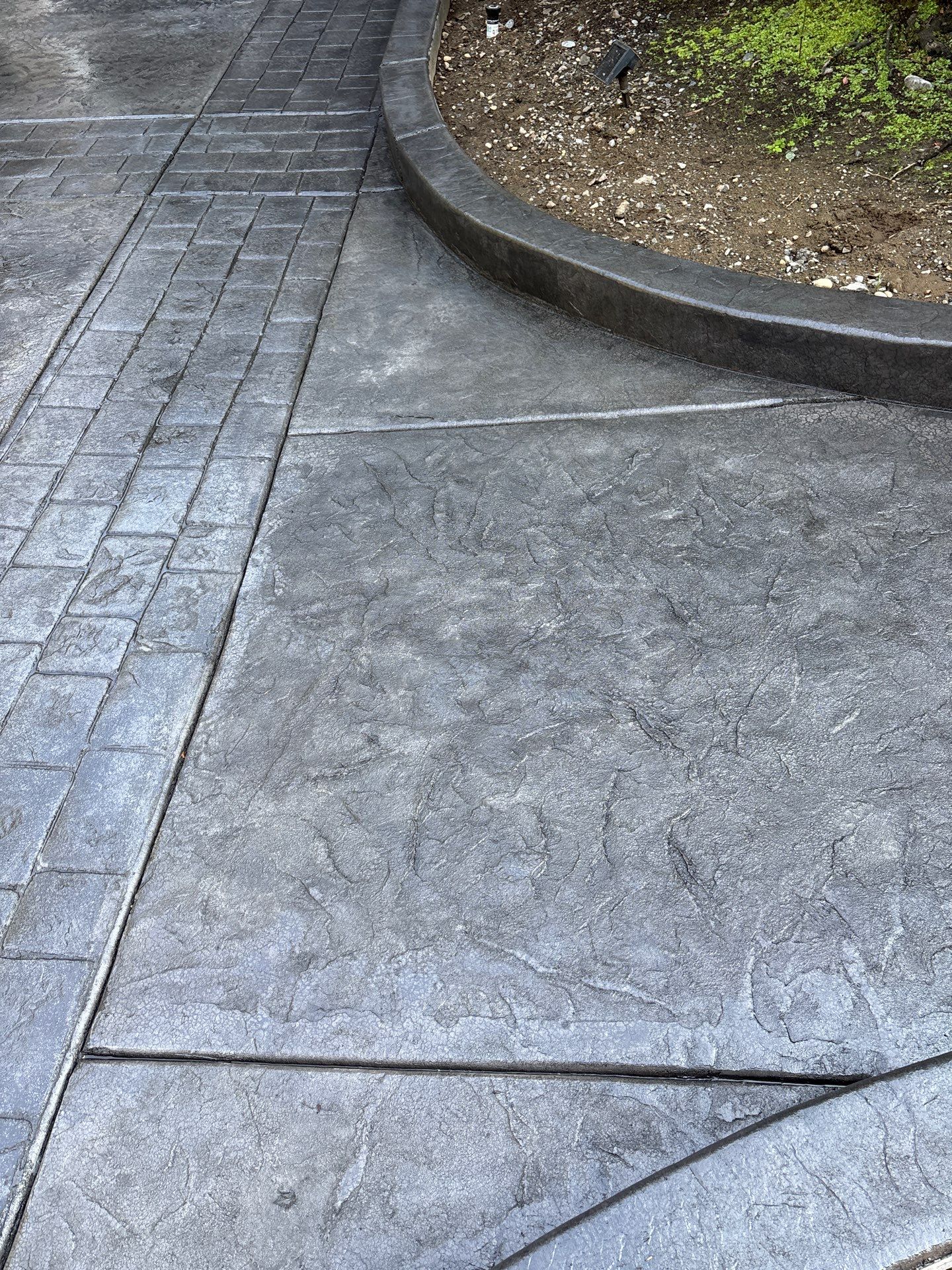 Multi-color Stamped & Sealed Concrete Driveway Renovation | Mukilteo by Jireh Asphalt & Concrete Inc