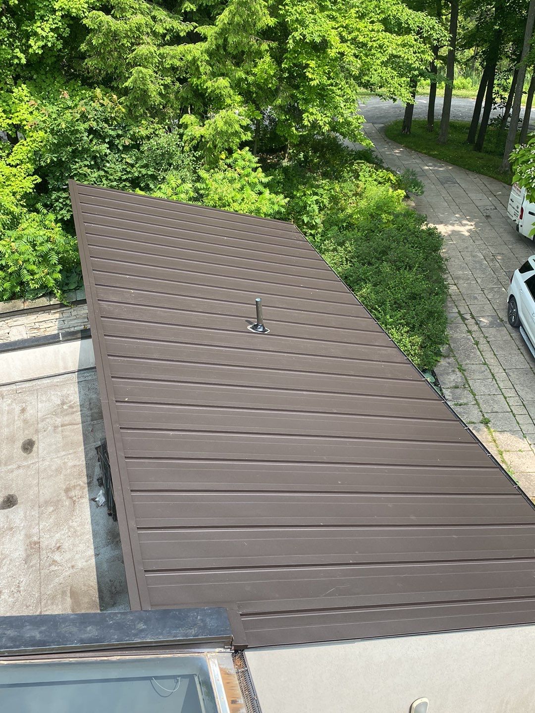 Roof Replacement using 16" Standing Seam Panels by Jay Carter Roofing & Sheet Metal