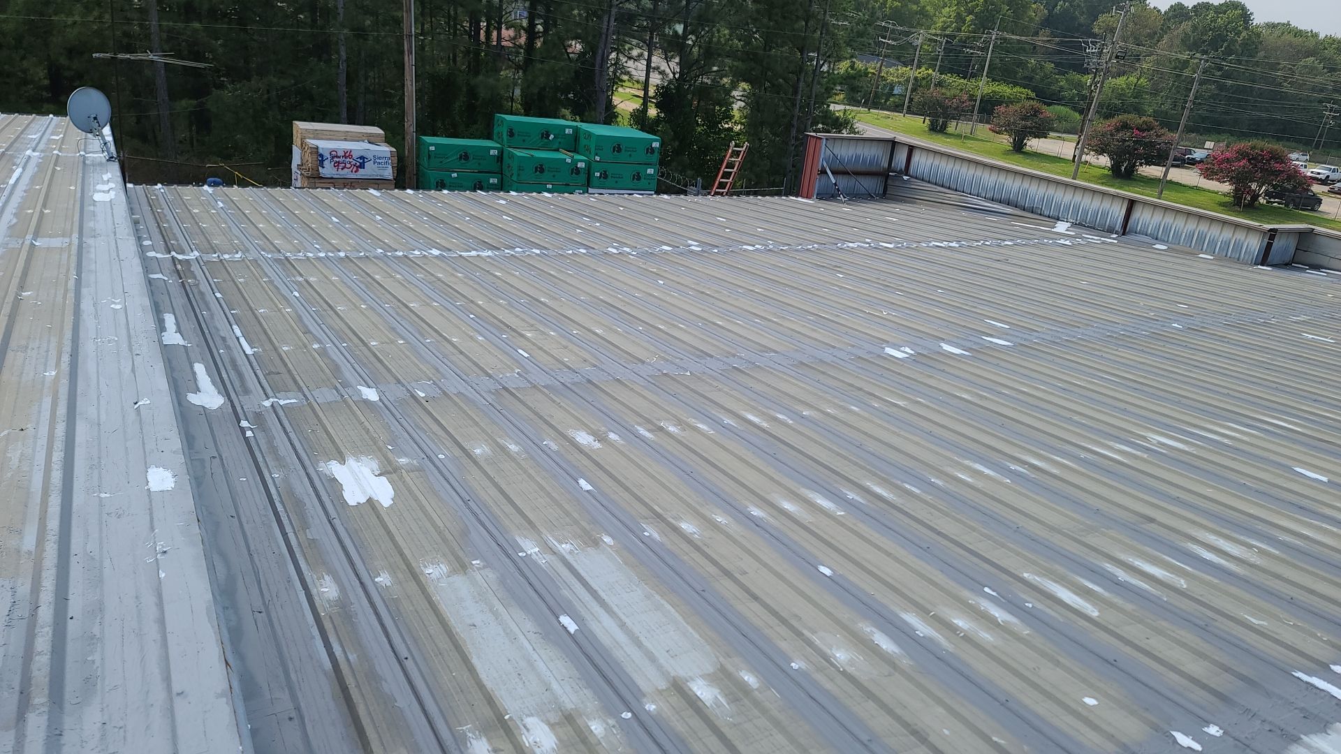 Commercial Roofing Installation using Aldocoat Coatings by Hostetler Roofing