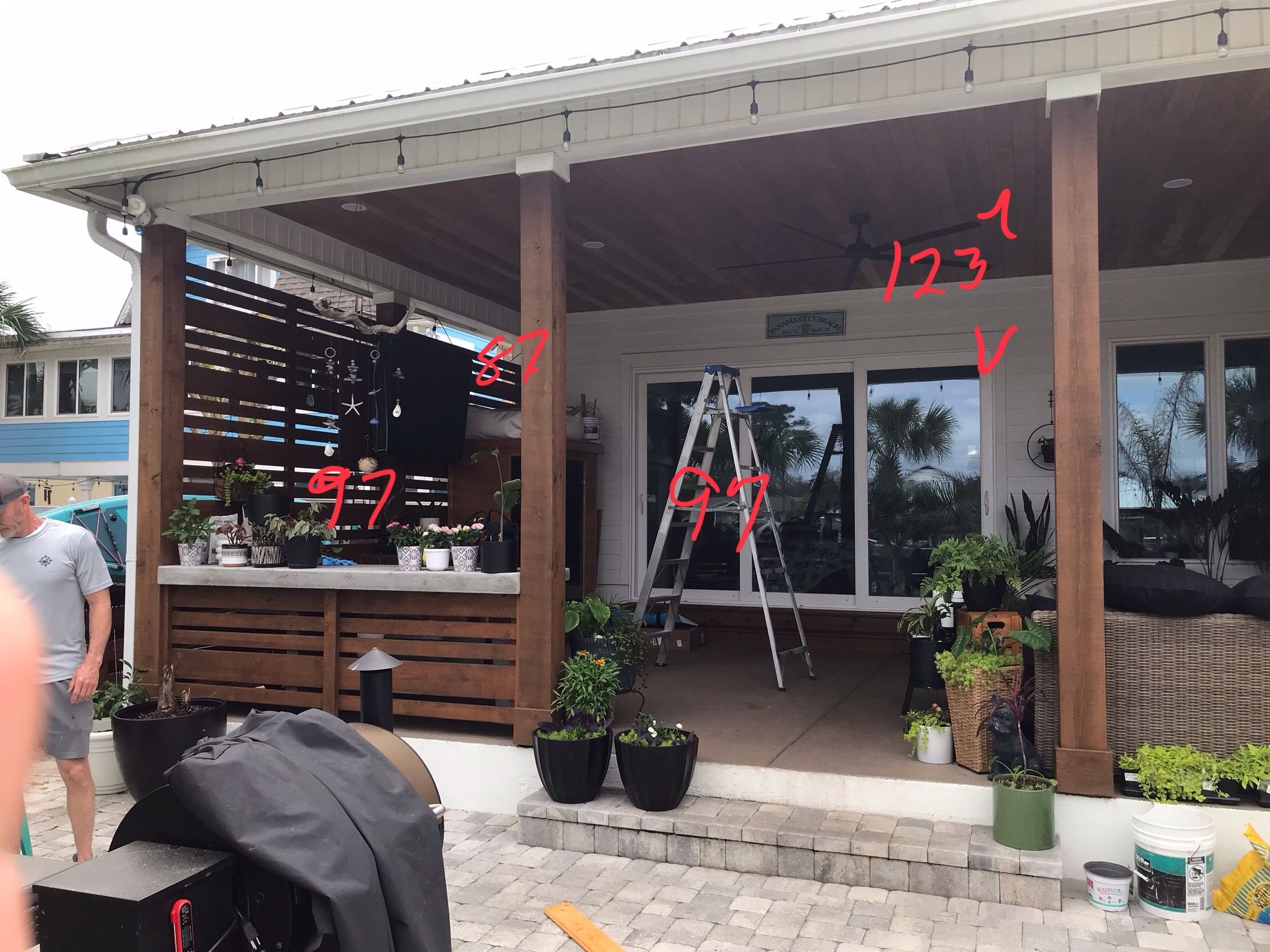 Motorized Fenetex Screen Installation for a Panama City Outdoor Patio by Brannan Aluminum Inc.