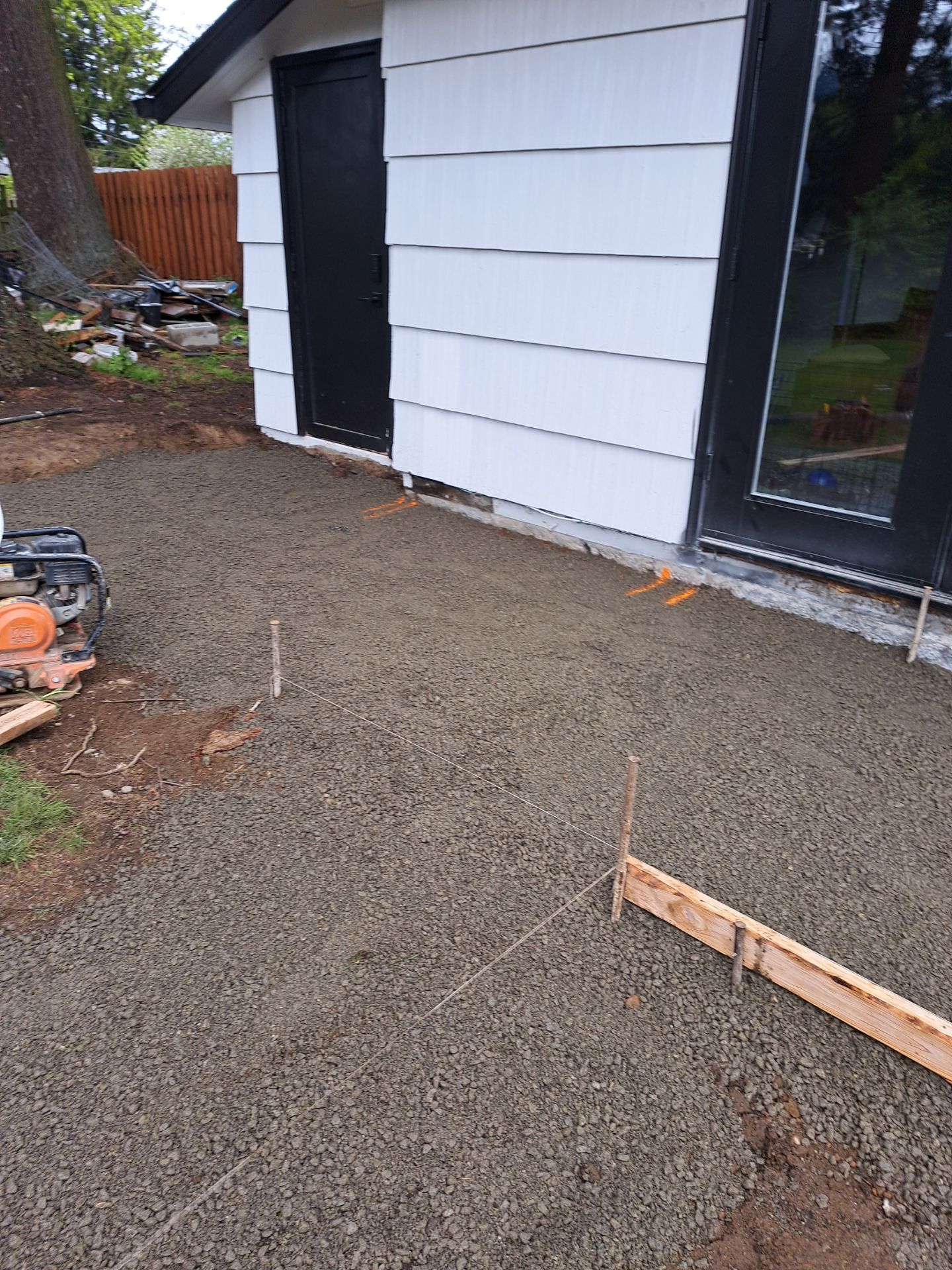 John | Concrete Backyard Walkway by Jireh Asphalt & Concrete Inc 