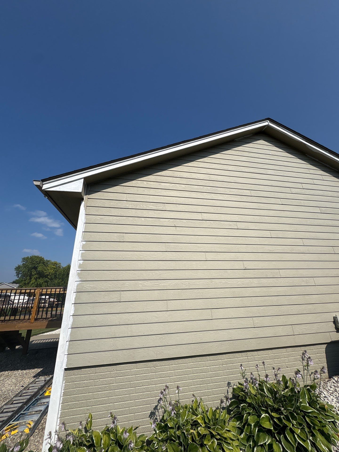 Residential Exterior Painting and Siding Refresh in Sioux Falls by Select Painting, Coatings & Garage Cabinets