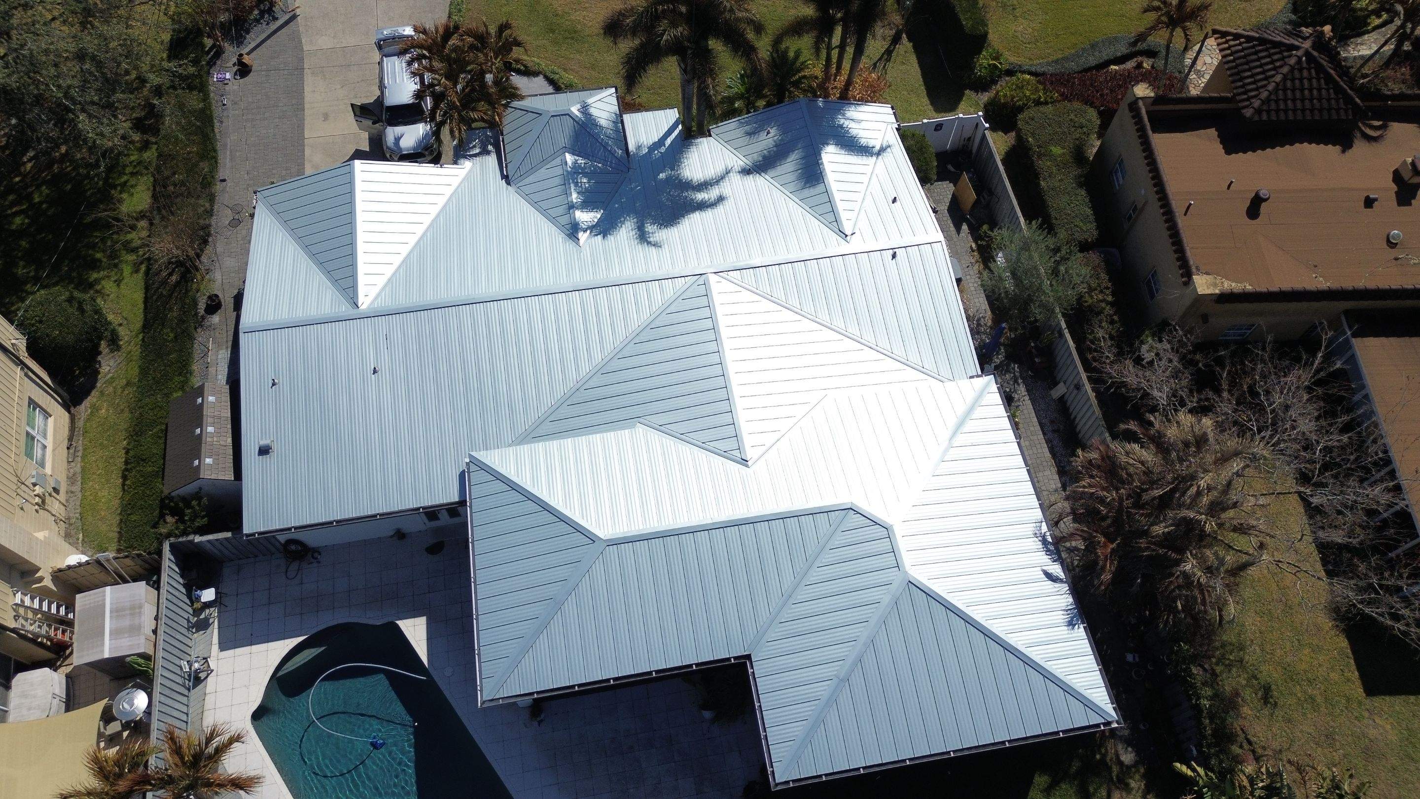 Metal reroof project in Belle Isle FL by Gold Key Roofing