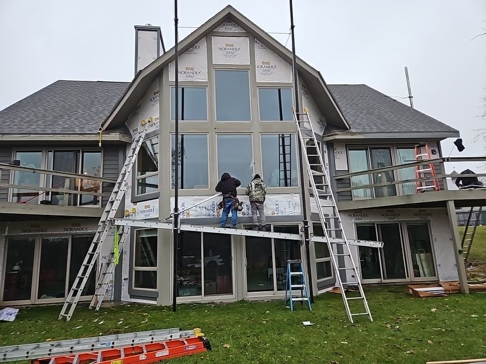 Siding Installation using Norandex Polar Wall Plus Siding, Window Wraps by Total Exteriors