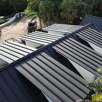24ga 1.5" Mechanical Seam Dark Bronze by Total Roofing System The Metal Roof Experts