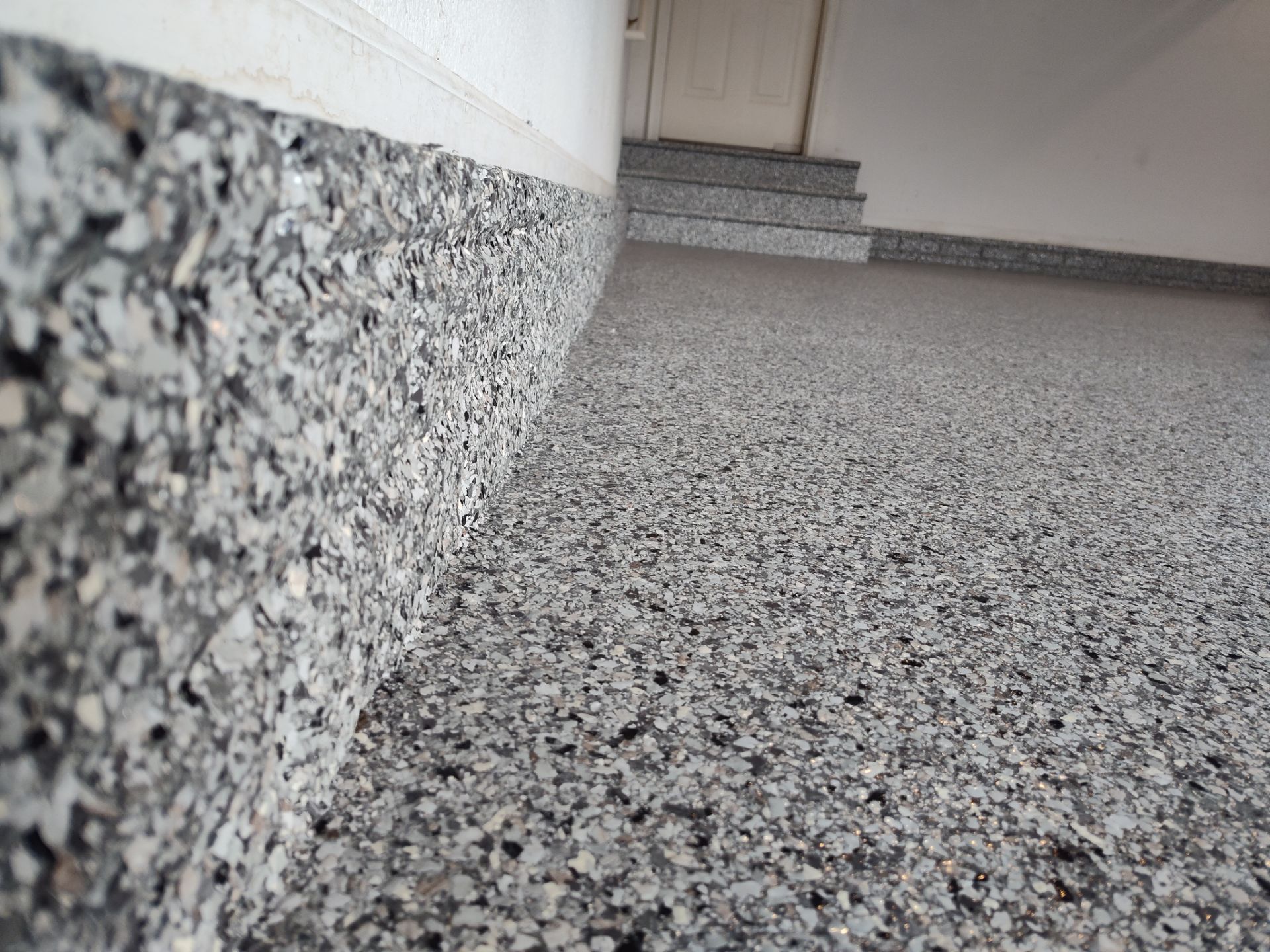 A Garage In One Day Keeps the Rock Salt Away! by Revival Concrete Coatings, LLC