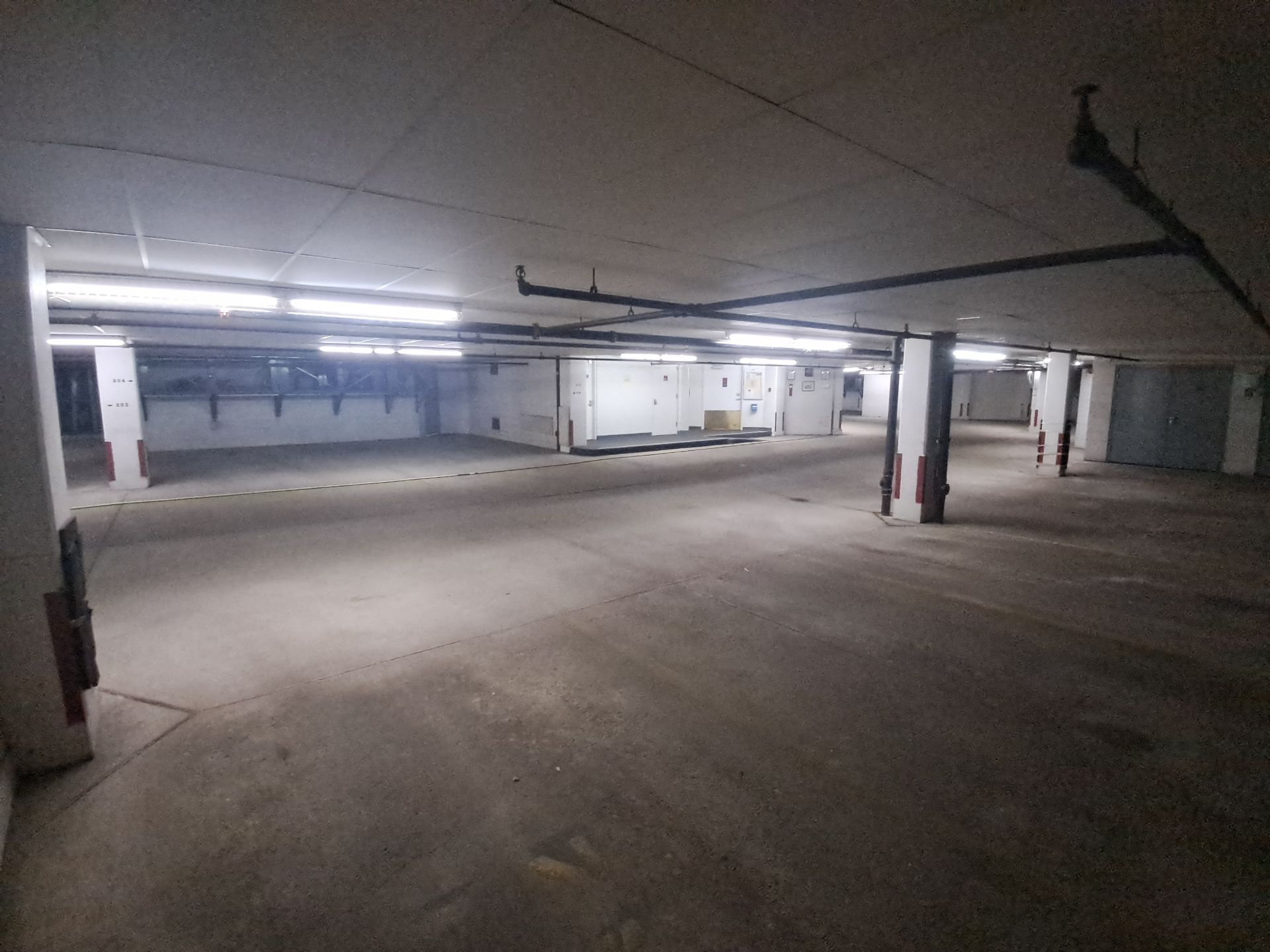 Parking Garage Sweeping & Concrete Deep Cleaning by Northern Power Washing LLC.