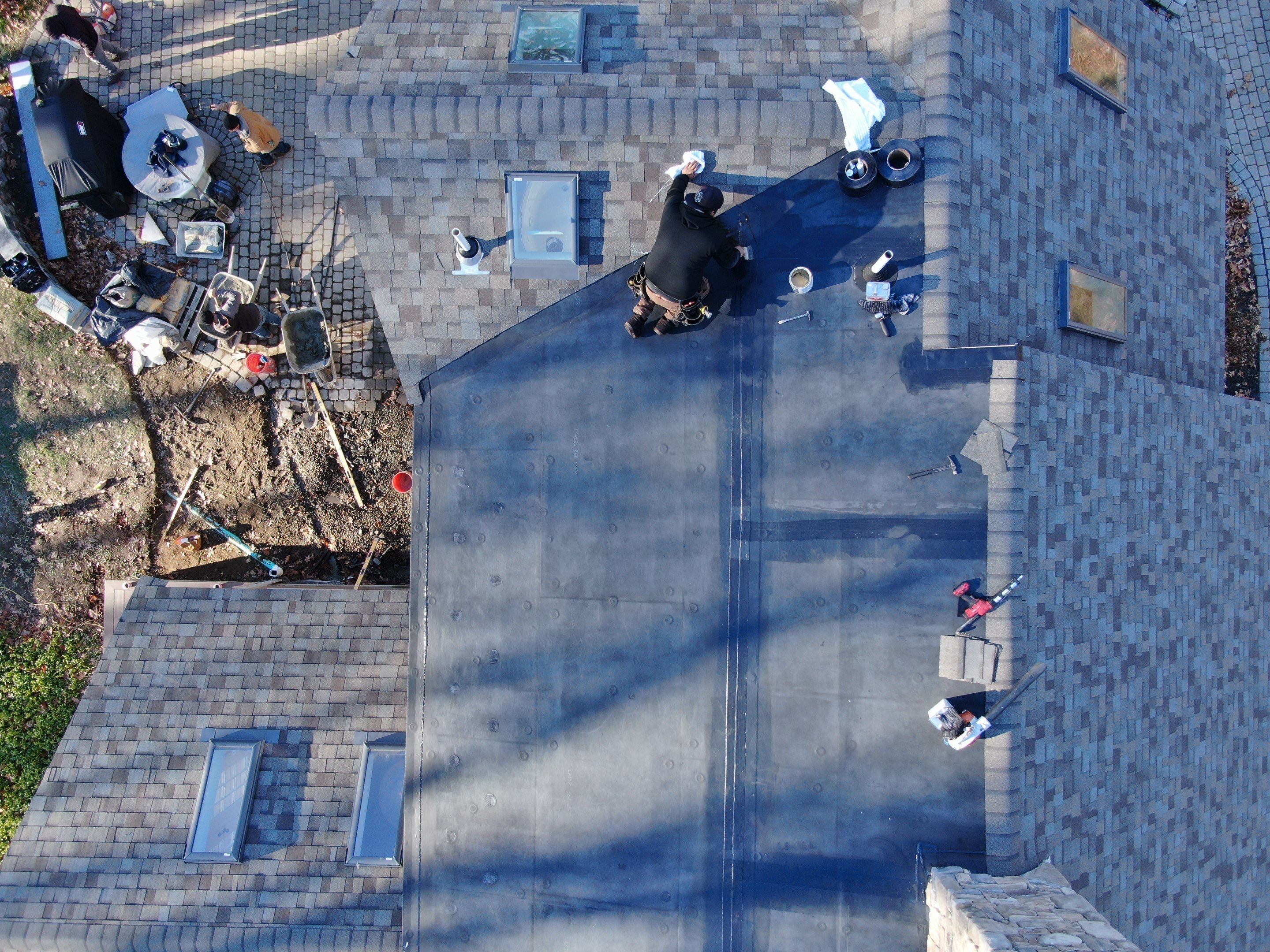 Complete House & Barn Roof with 13 Skylight Reflashing + EPDM Repairs by Mighty Dog Roofing of Greater Middlesex County