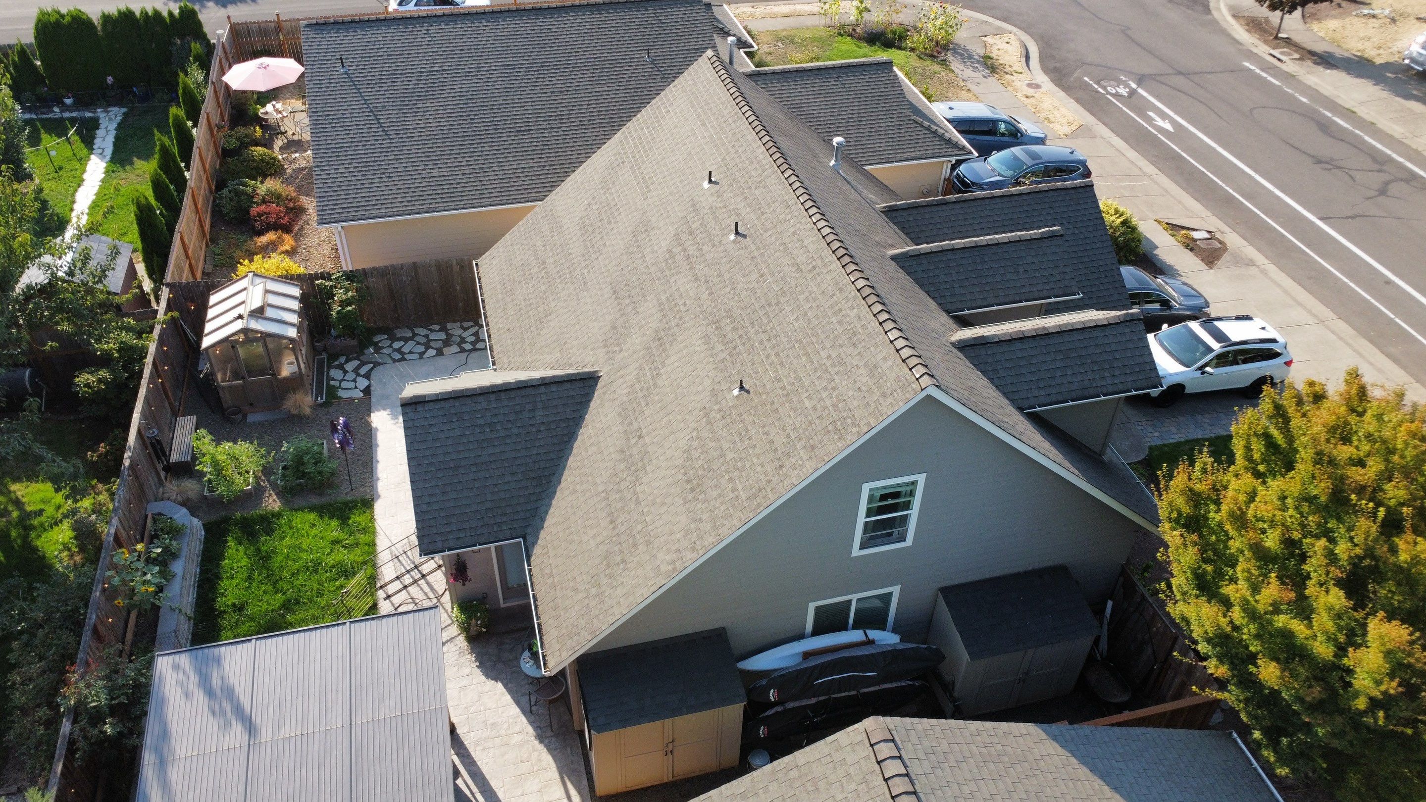 Granite Black Residential Roof Replacement by Orezona Building & Roofing Company, Inc.