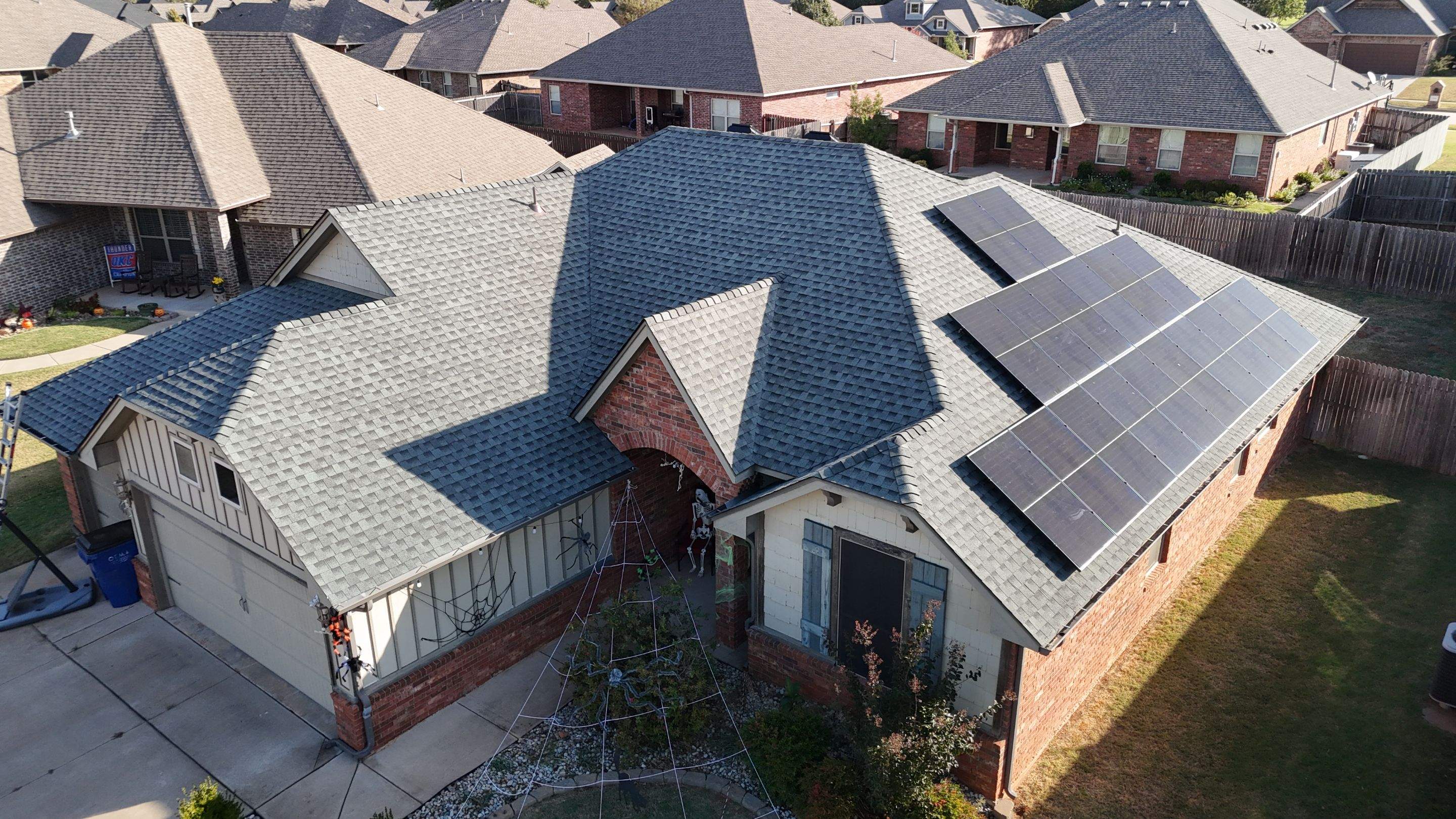 Roof Replacement in Mustang, OK by 5Coat Roofing & Construction