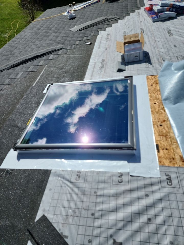 Residential Roof Installation and Skylight Replacement in Kiel, WI by Gellings Roofing & Siding