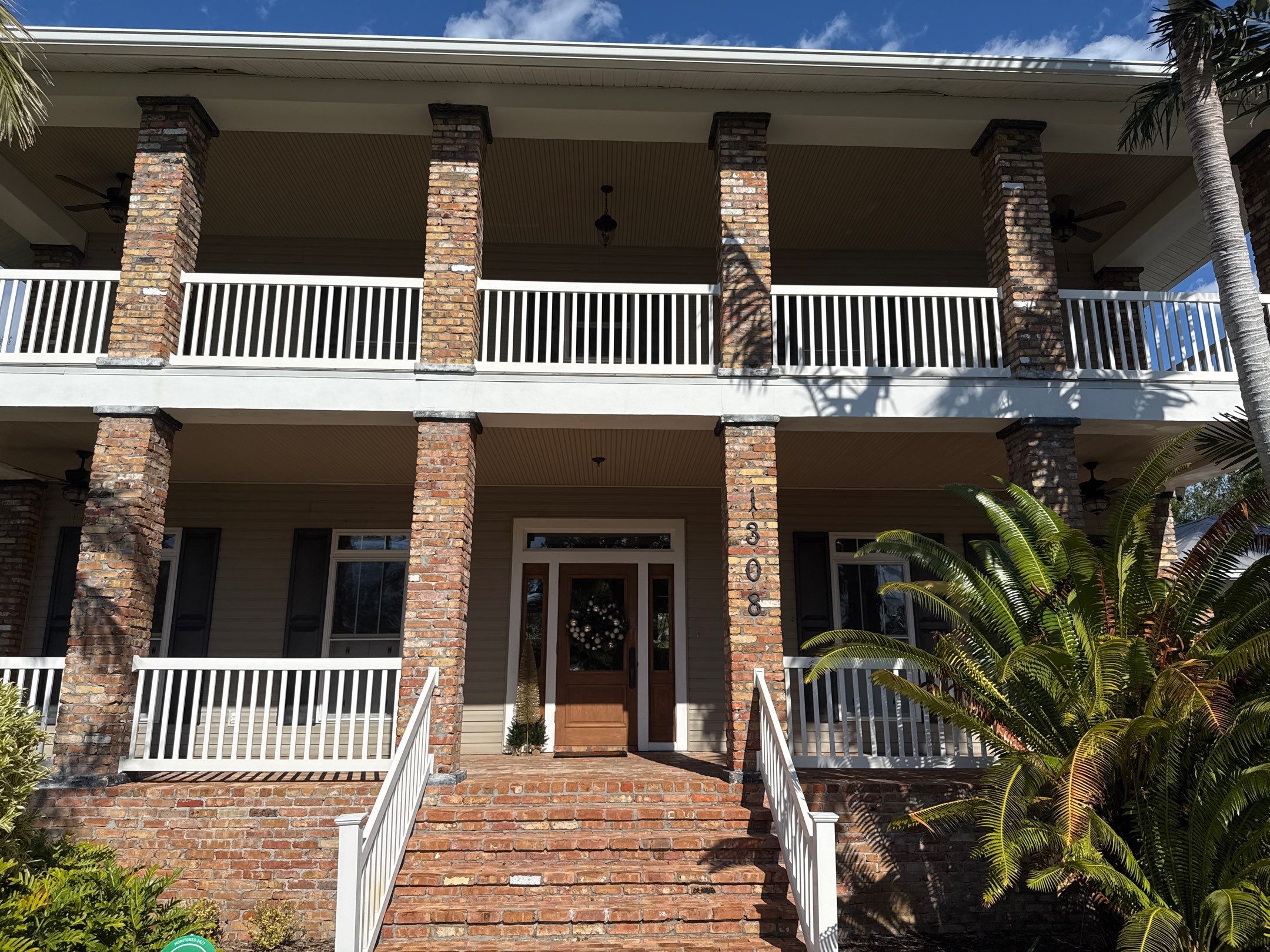 2-Story House Wash and Garage Pressure Washing in Palmetto, FL by Sunshine AquaWash