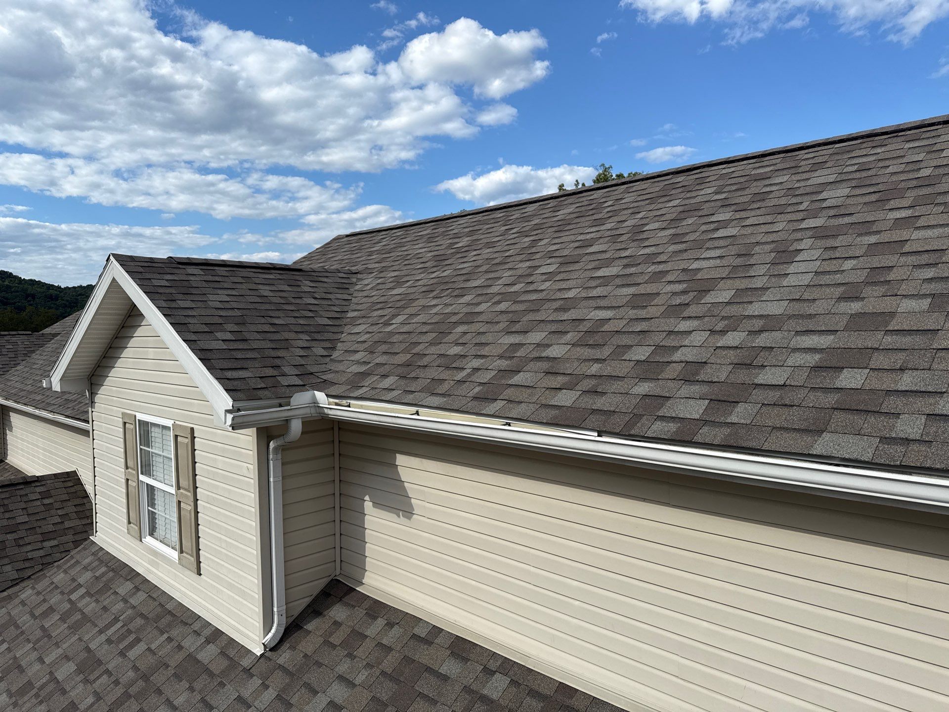 Residential Roofing Installation using Driftwood by Rainstoppers Roofing
