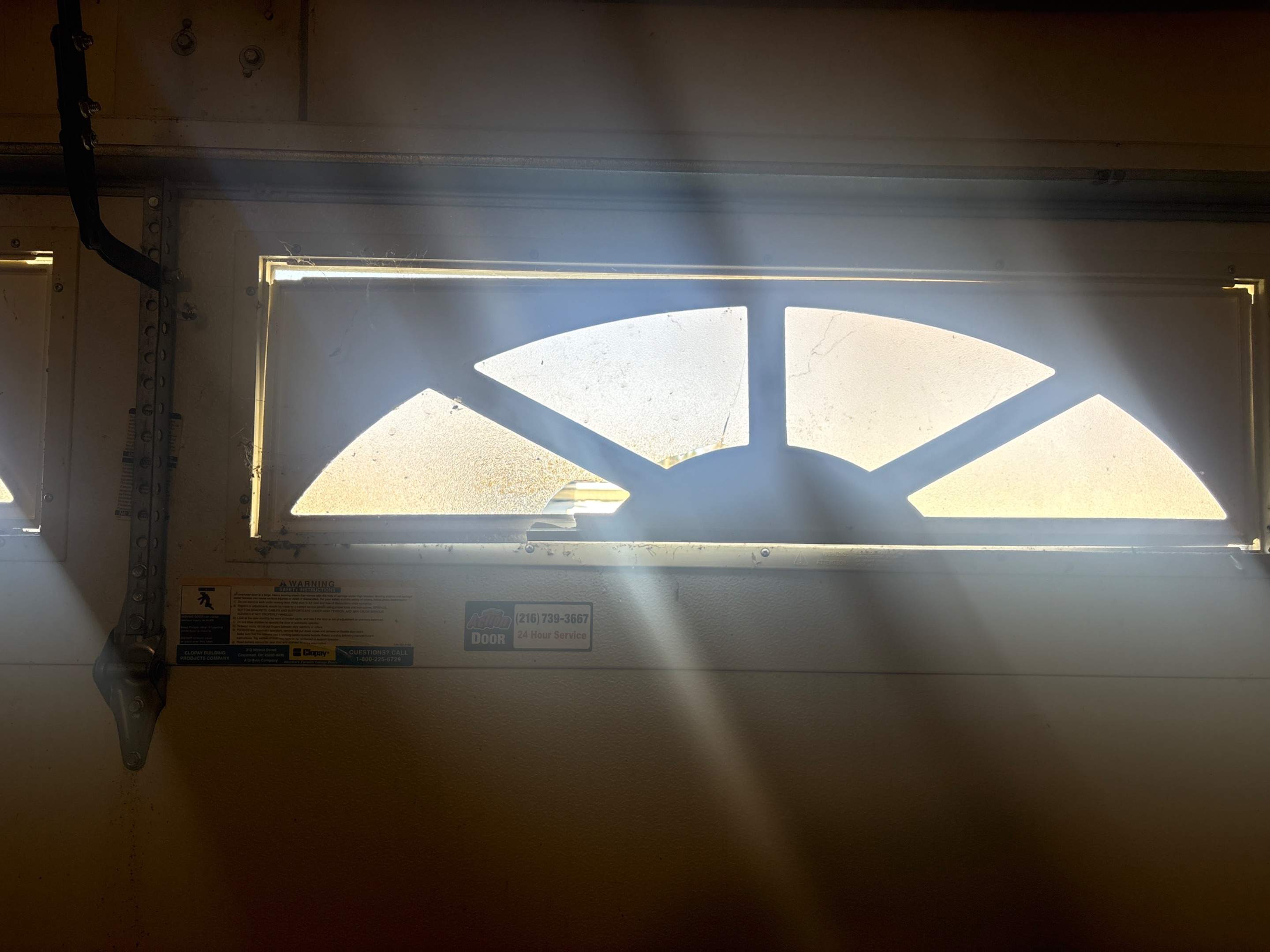 Garage Door Installation With Decorative Windows in Solon OH by Ohio Garage Door Repair