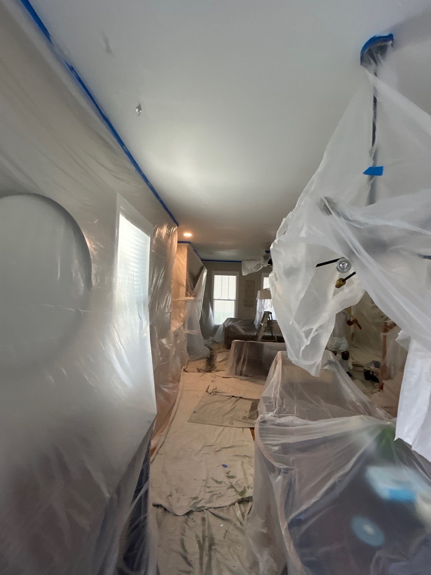 Drywall damage repair and repaint by GonzalezPainters & Contractors Inc 