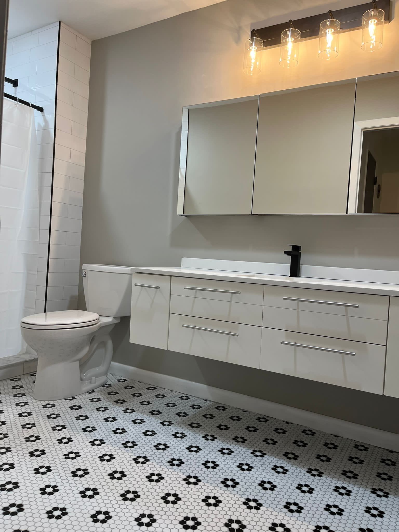 Bathroom Remodel using Tile by Home Concepts Construction