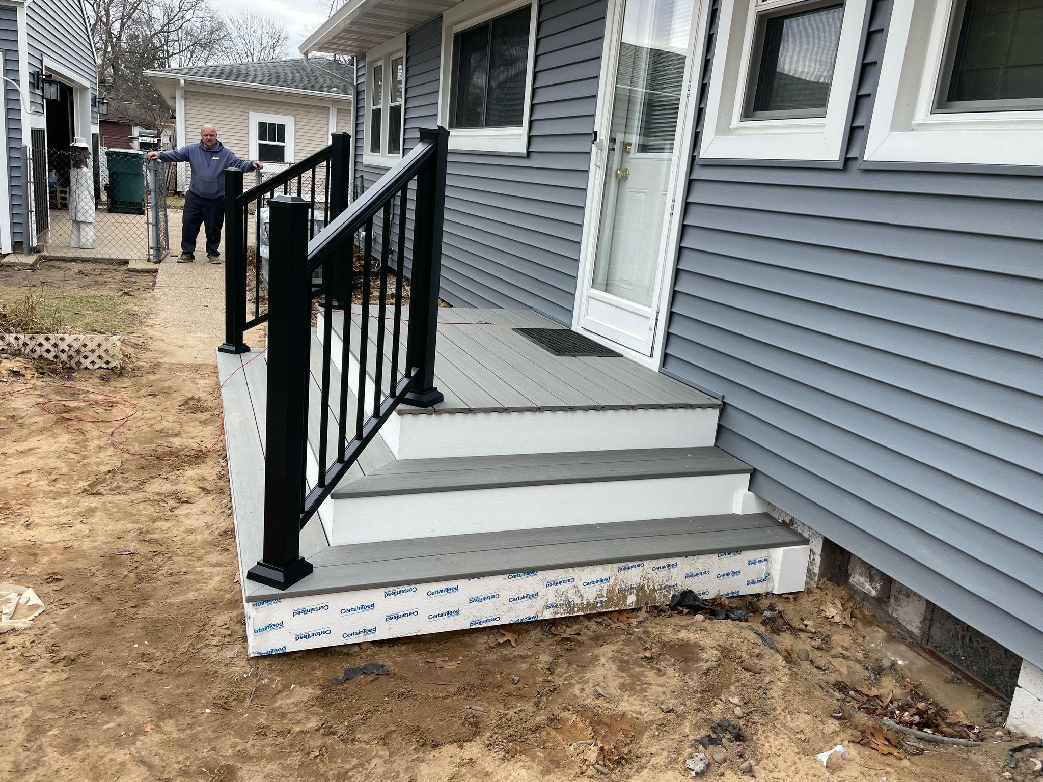 Siding, Front and Back Porch  by Avalon Roofing and Exteriors