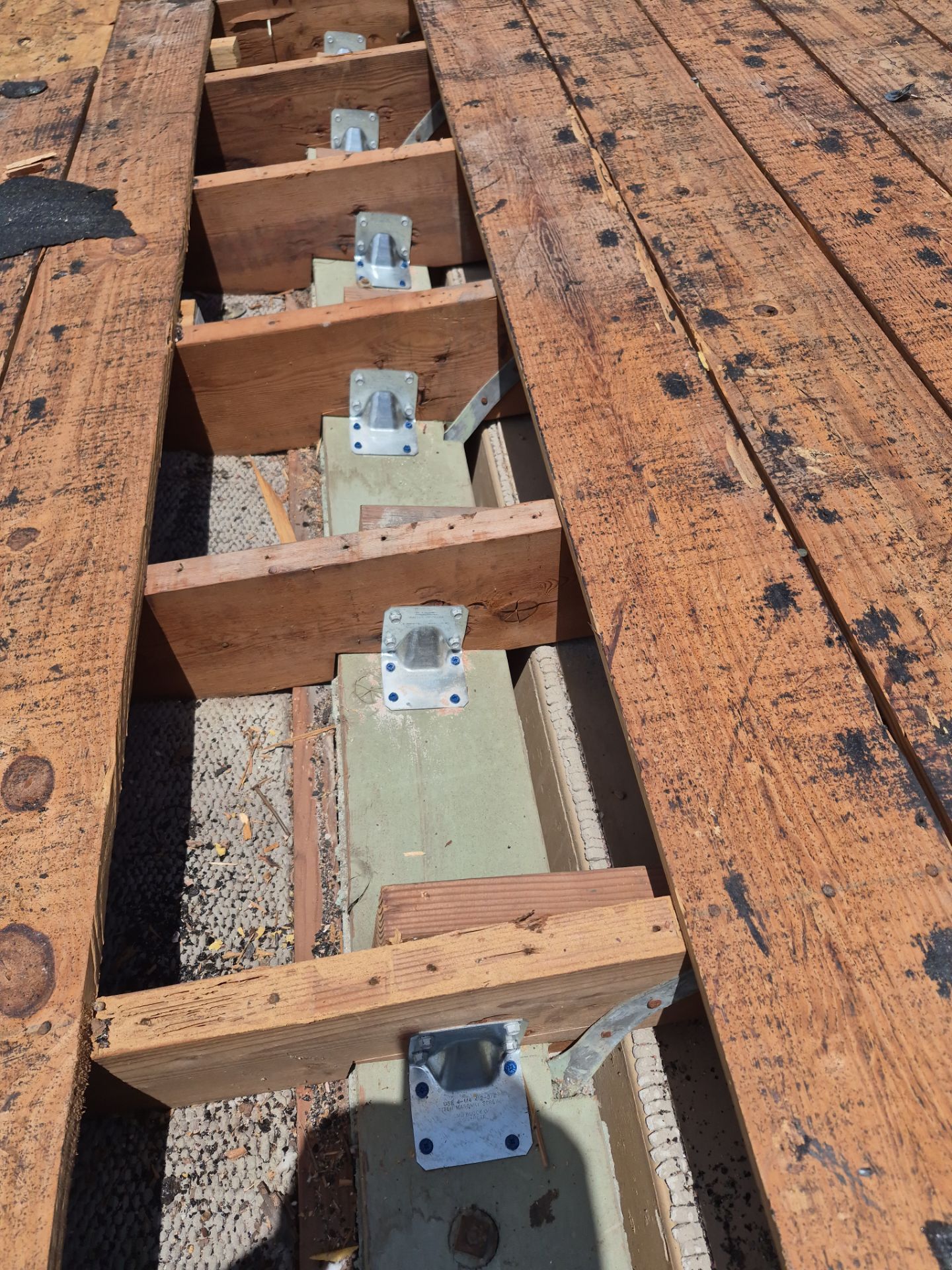 Residential Roofing Installation using 1" Nail strip metal roof by BLUES BROTHERS ROOFING