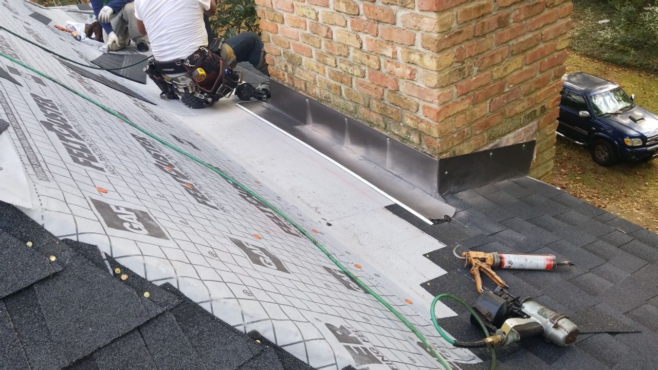 Residential Roofing Installation using Roof Replacement by American Roofing & Construction LLC