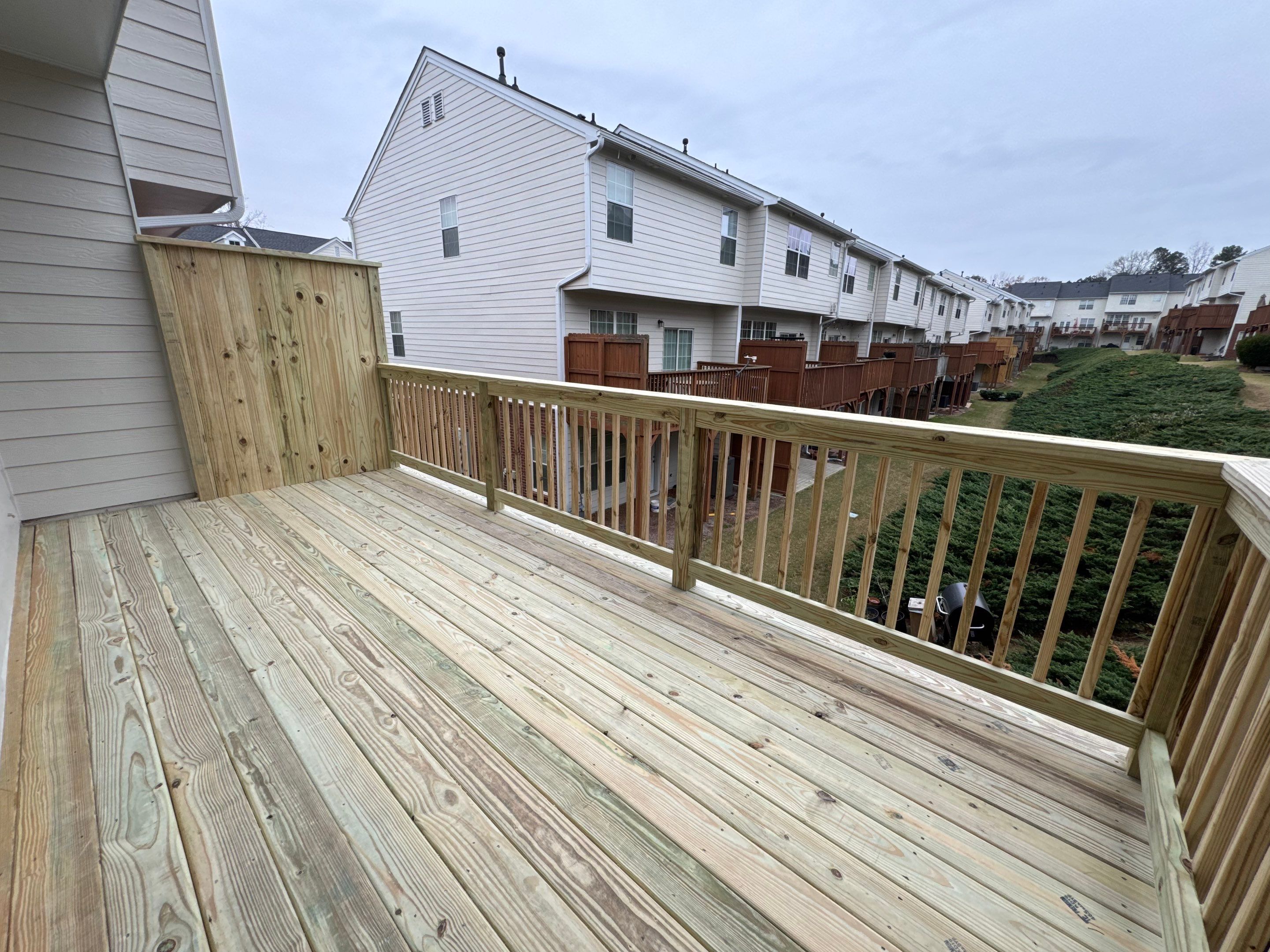 New Second-Story Pressure-Treated Wood Deck Installation in Atlanta by Swift Home Renovations