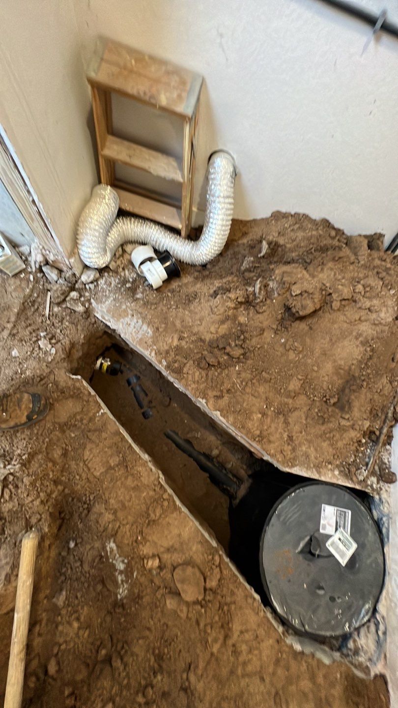 Basement Sump pump/pit by Plumbing Connect Systems LLC